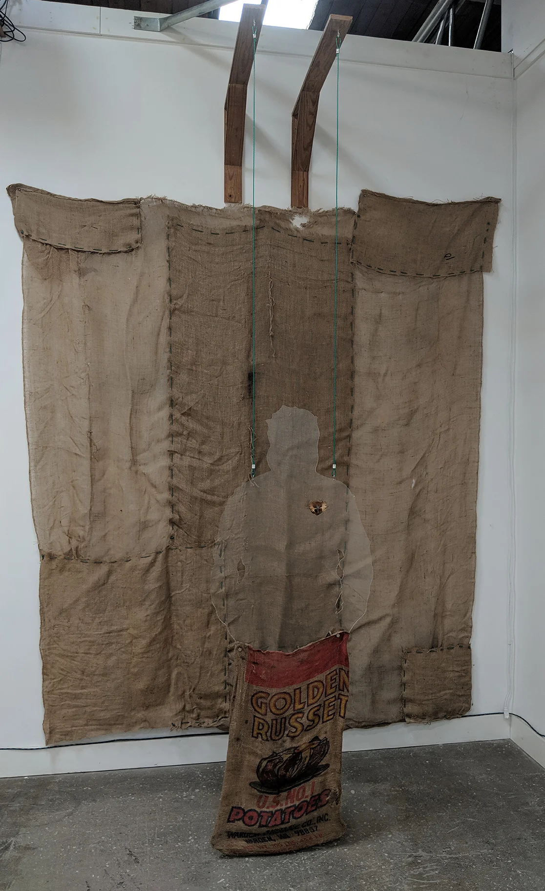 “Sack Race…” installation at Revolve Gallery in Asheville, NC. 2018.
