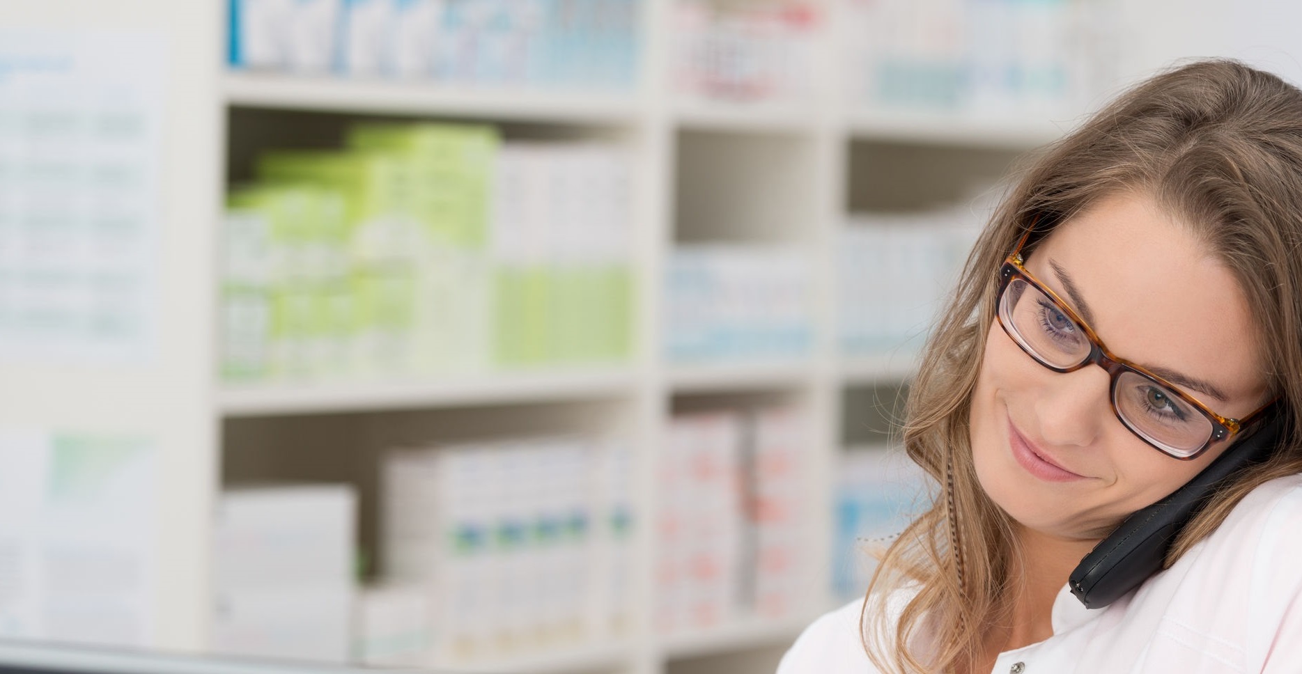 Pharmacist discussing a medical prescription