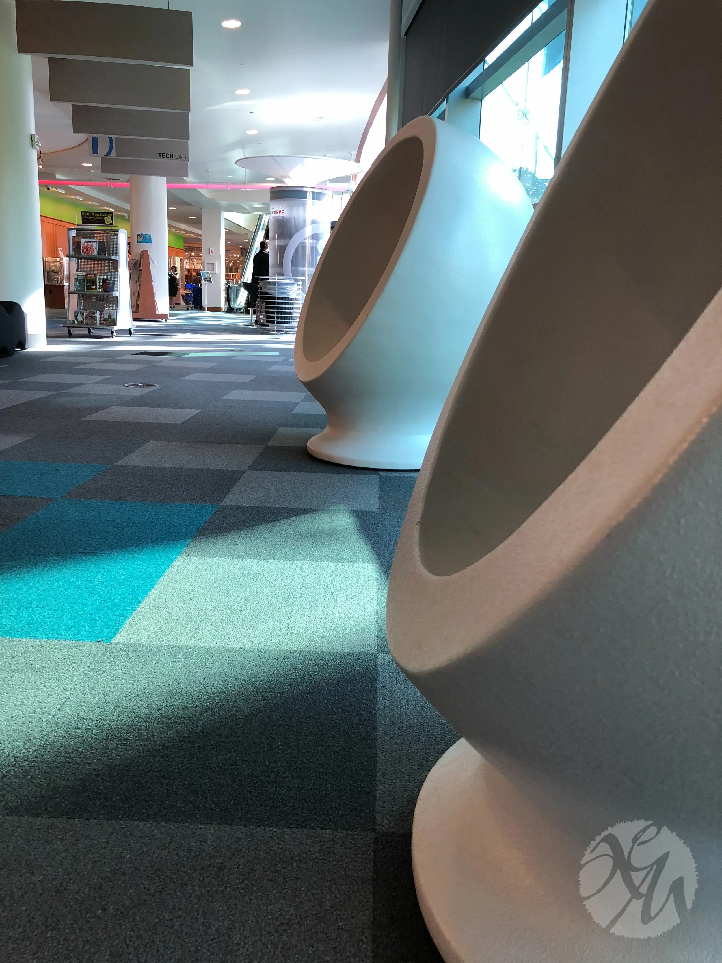 Fun chairs are a requirement for library kids' areas, aren't they? 