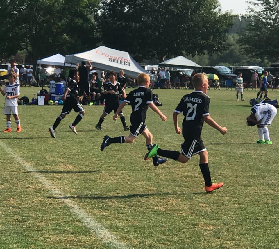  Force ‘07 Boys celebrate after scoring the winning goal vs. Eastside FC in the final minute of the championship match. 