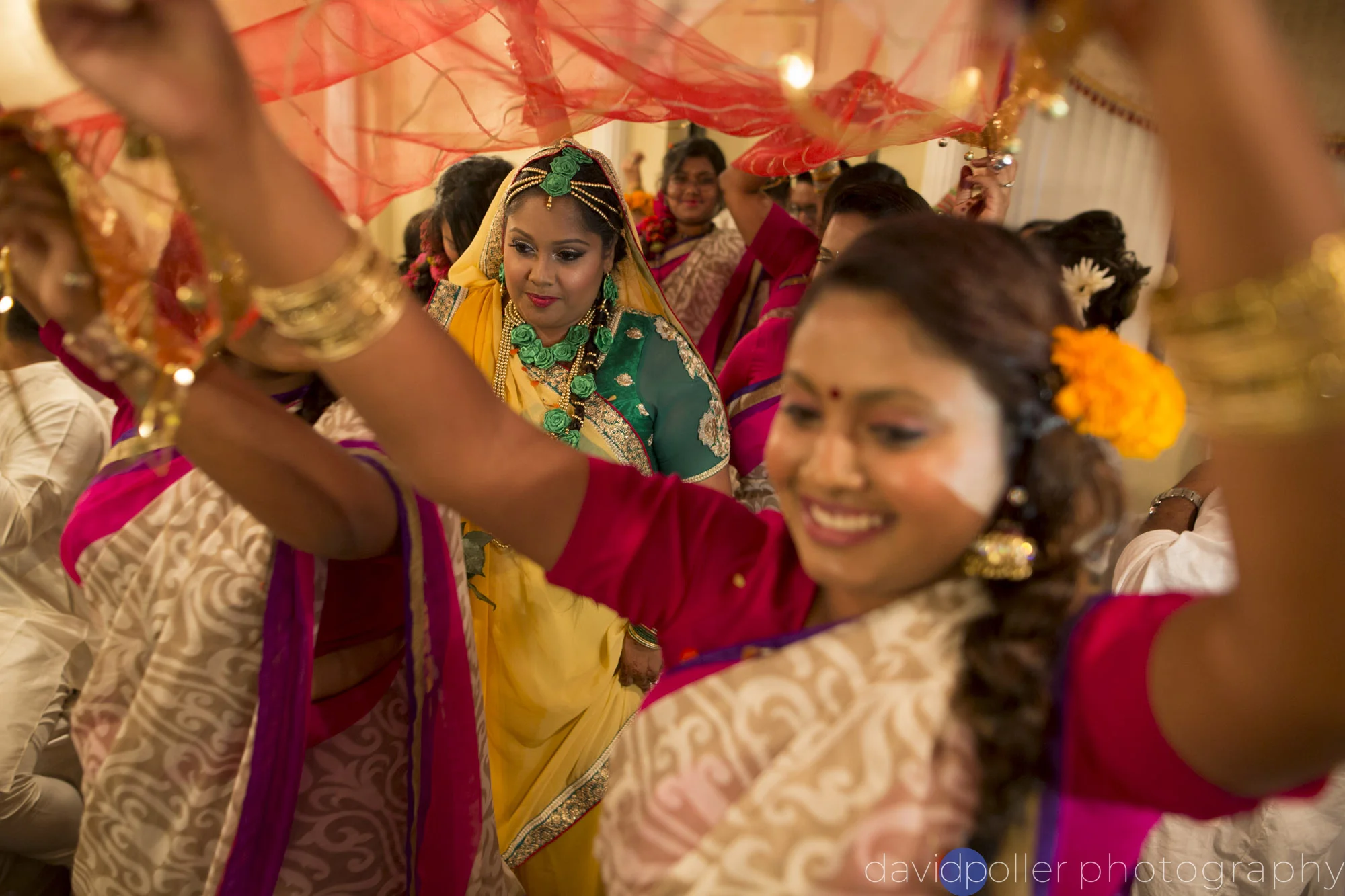 The bride-to-be makes her entrance at their Gaye Holud