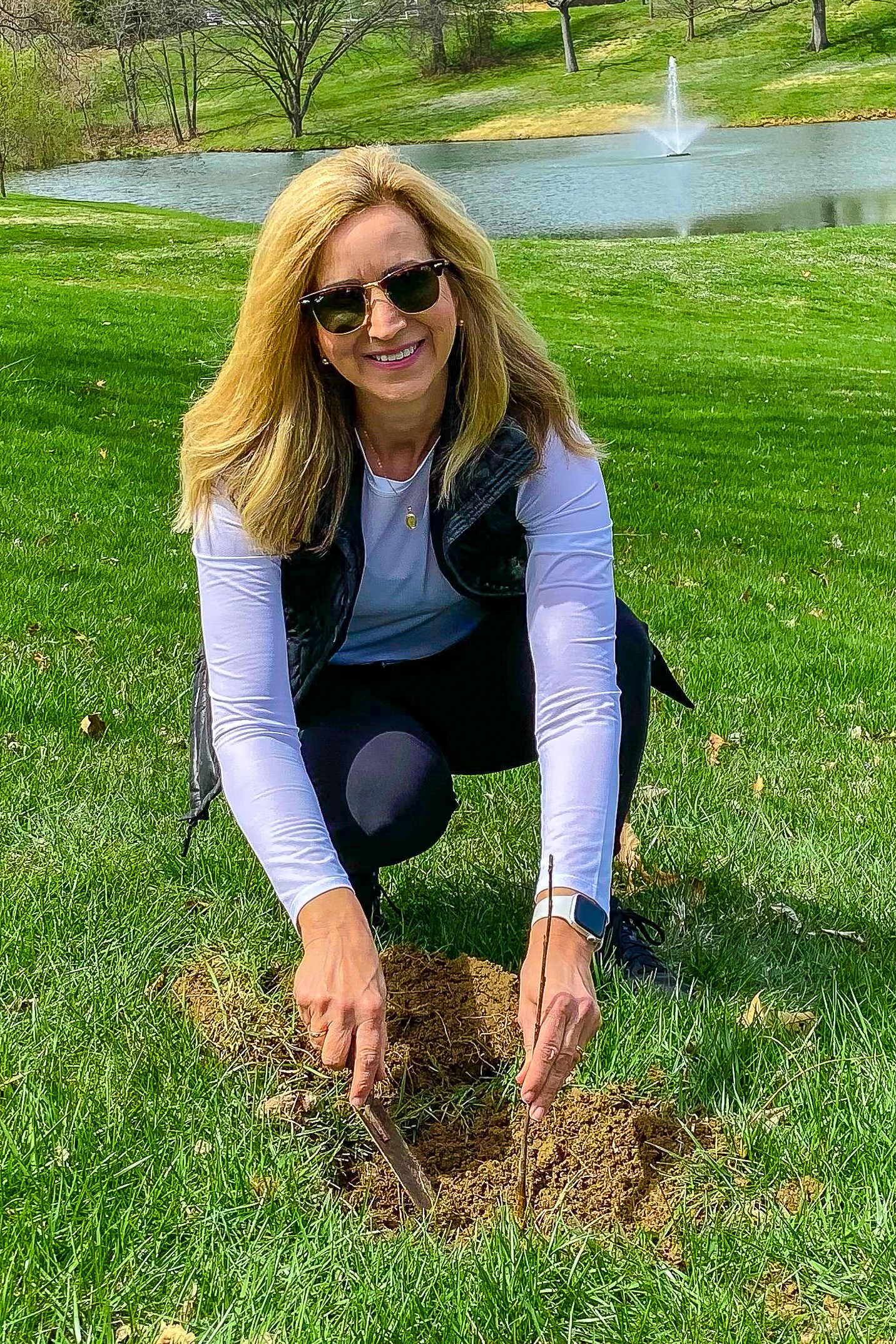 Attorney M. Beth Burger Planting A Tree.jpg