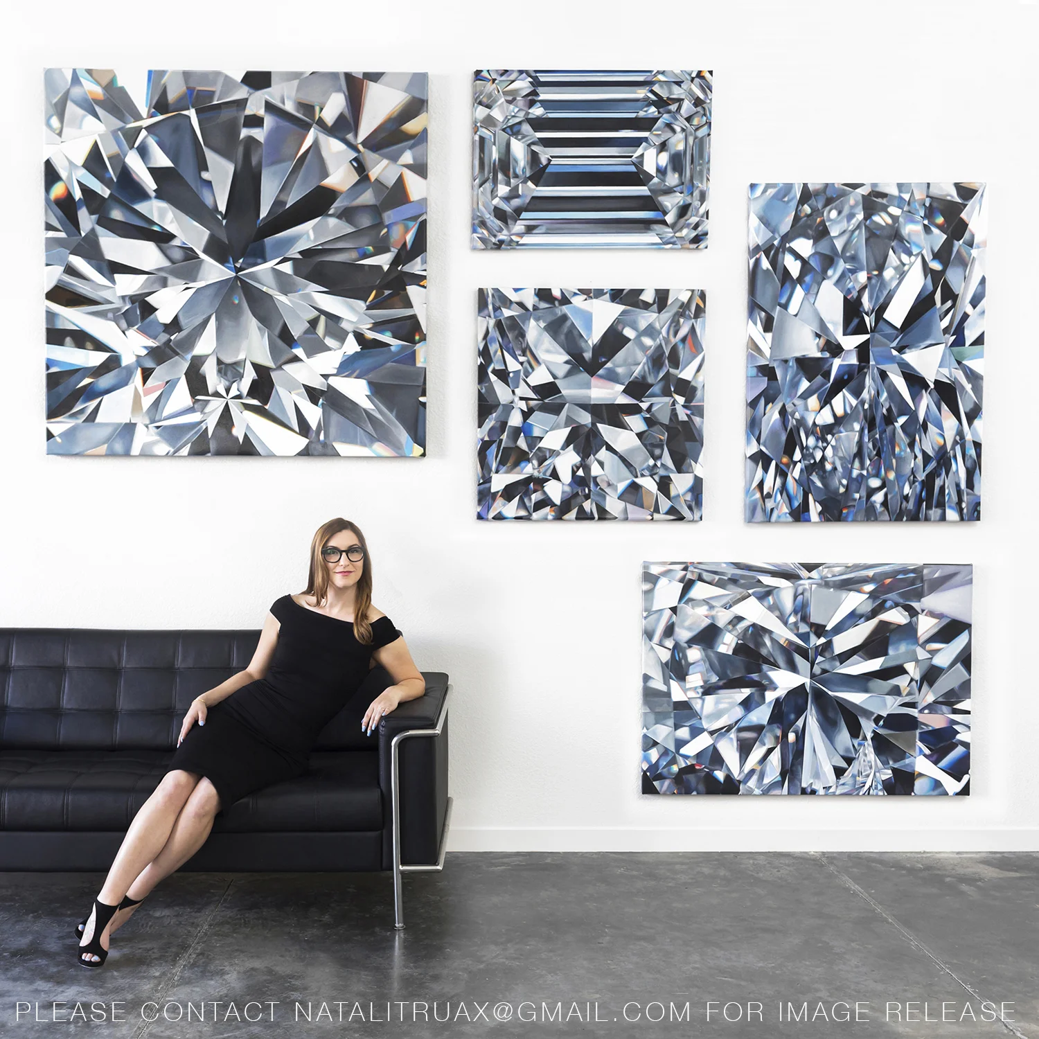 Angie with her paintings of the Queen of Kalahari collection, commissioned by Chopard.