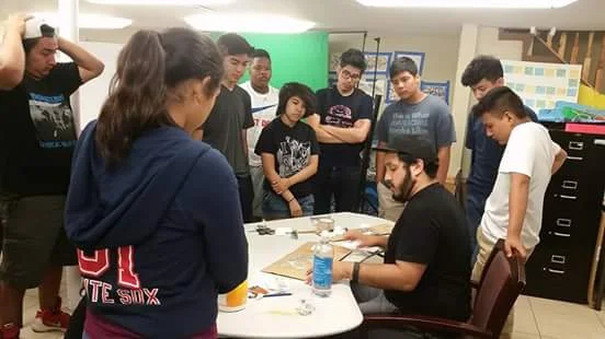 Learning how to create monotype prints to experiment with patter and design for our final mural. Photo Courtesy by Elevarte Community Studios