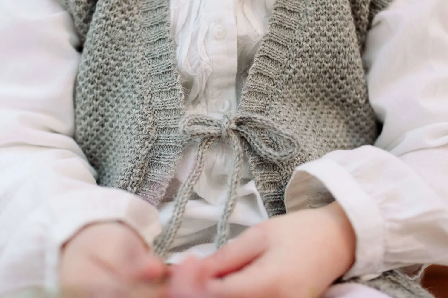 Grey vest with cord