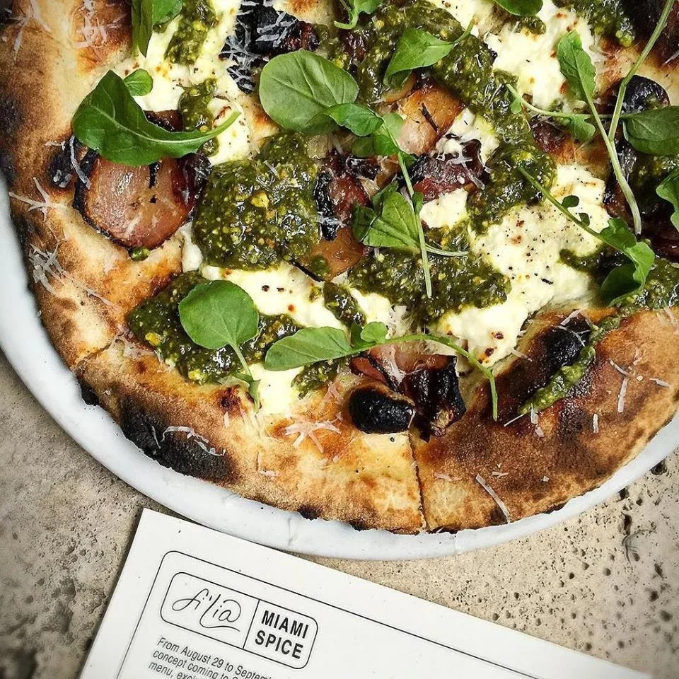 Pistachio Pesto Pizza with housemade ricotta, charred onion, and pecorino. Photo courtesy of Filia