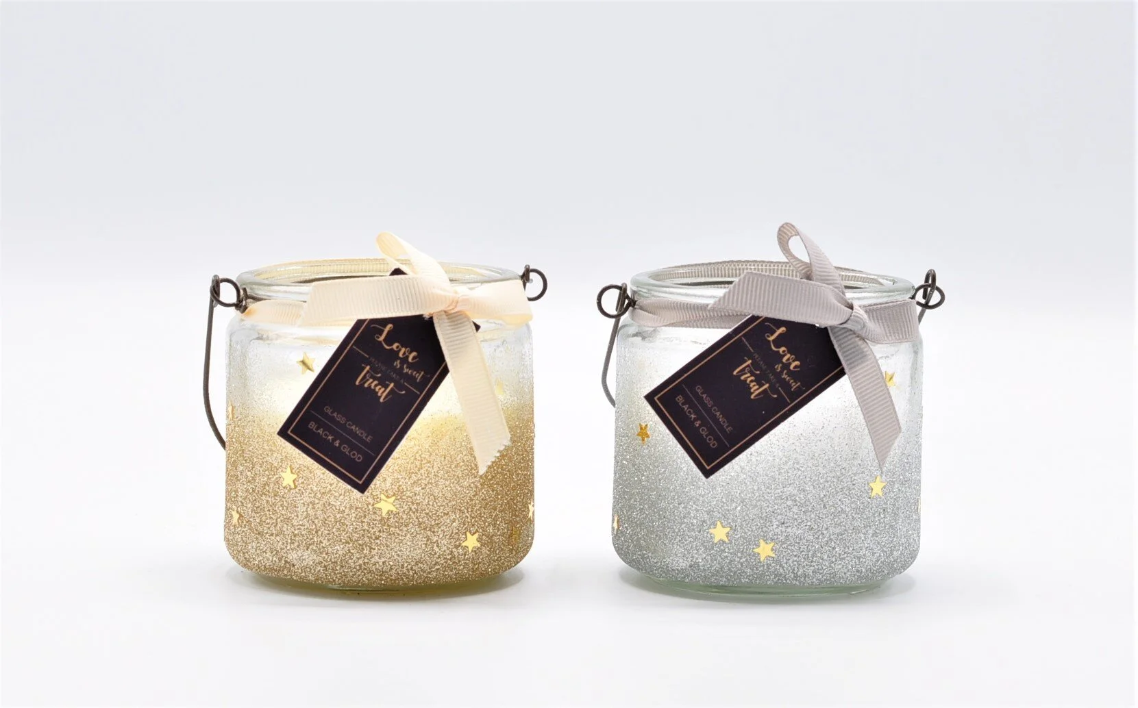 XMAS  7.5CM GLASS JAR CANDLE WITH HANDLE ASSORTED