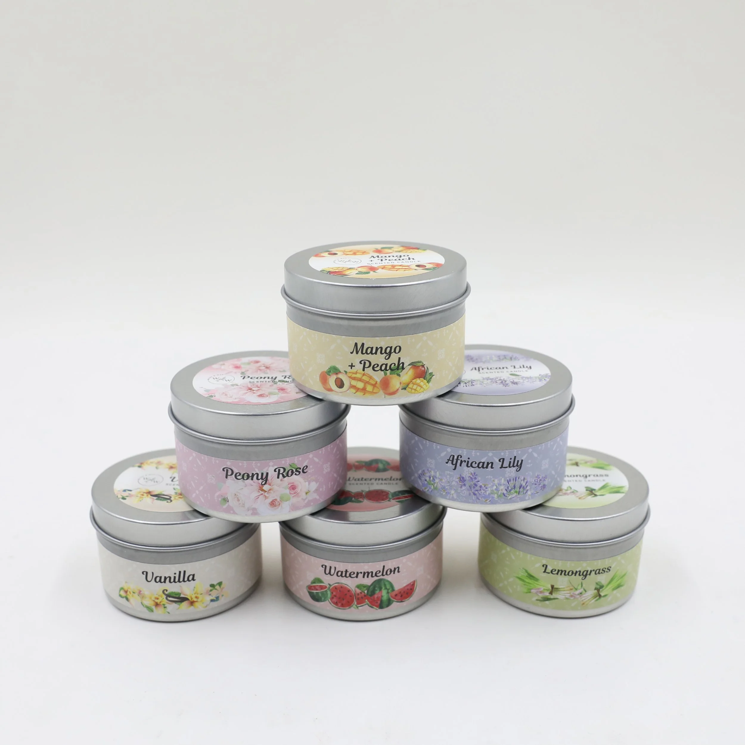 TROPICAL CANDLE IN TIN 6 ASSORTED