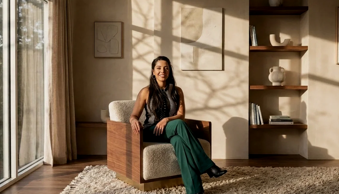 Psychologist Jeniffer Munoz sitting in a well-lit office space with neutral furnishings and large window generated by nano banana 2