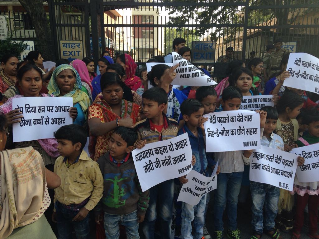Children and women protesting Aadhaar in mid-day meals outside Shashti Bhawan on March 17.