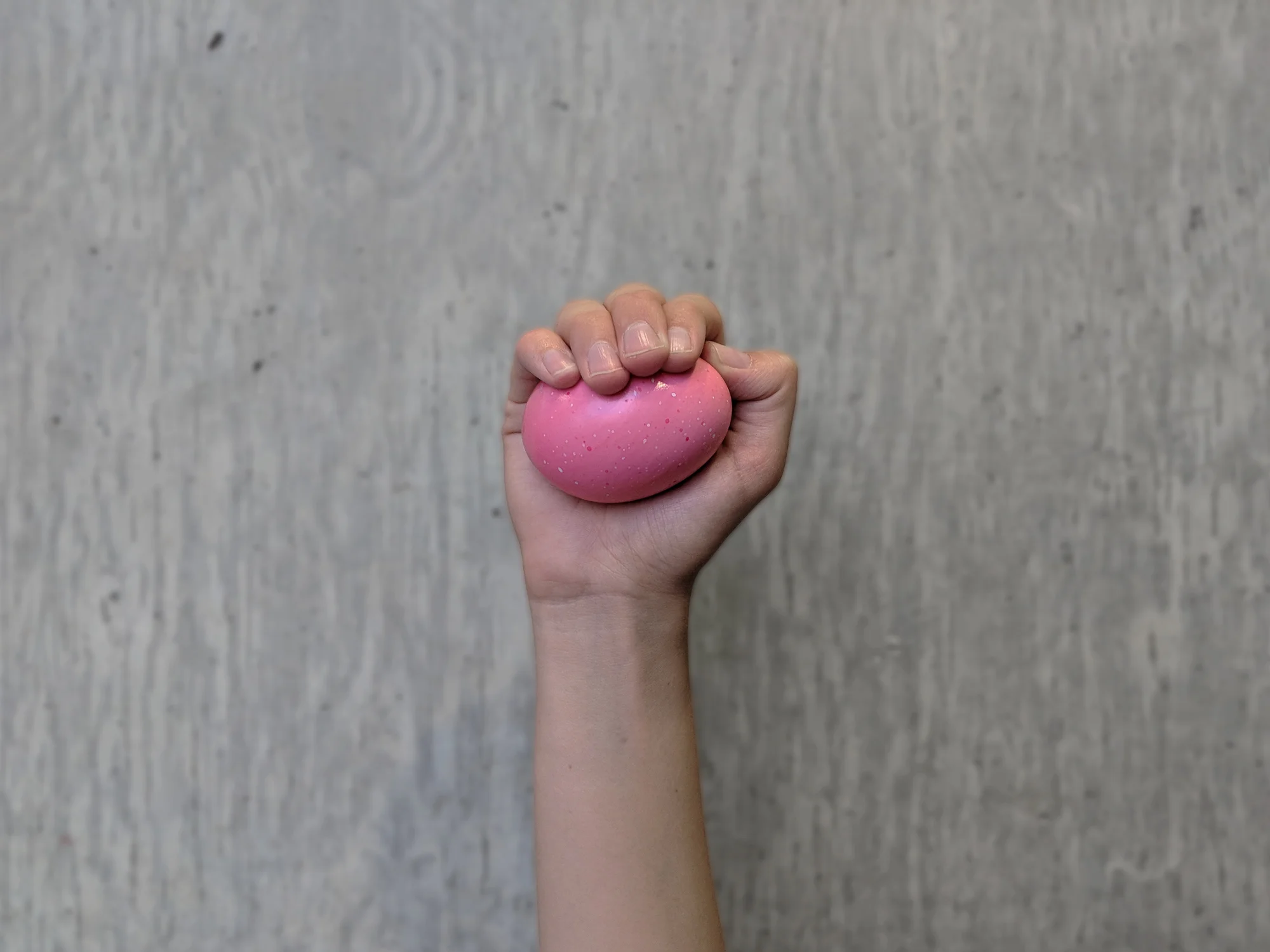 Pink Egg in Activist Hand, Re-occupying the Strata