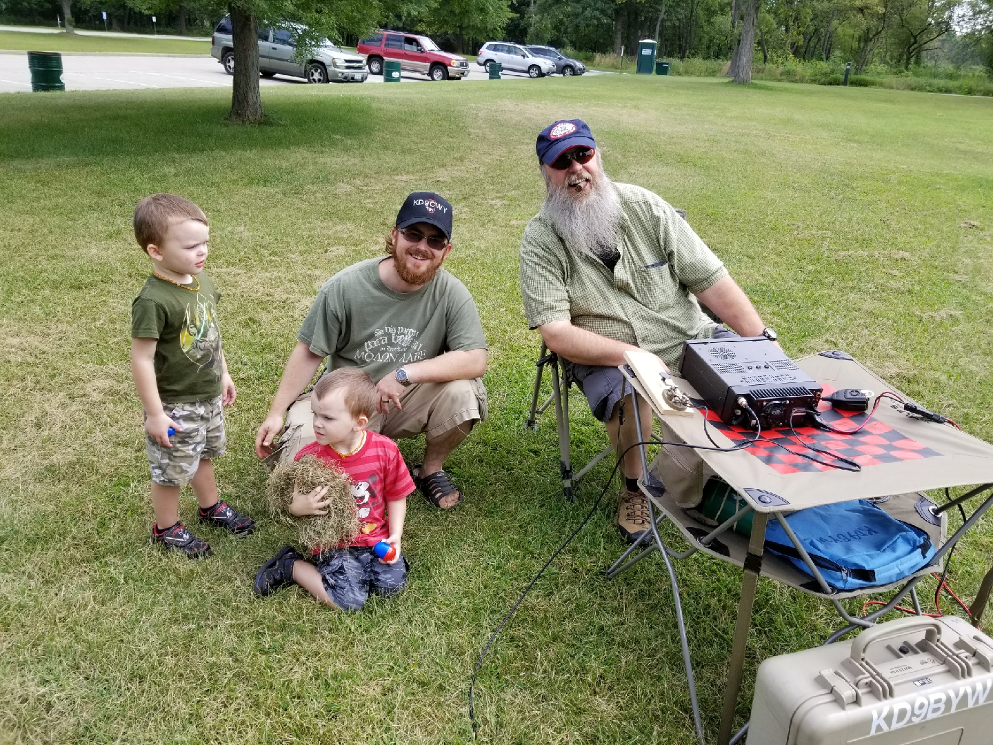 Tim (KD9CWY), Tim's twin boys - Hunter and Archer, and John (KD9BYW) - enjoying the day.