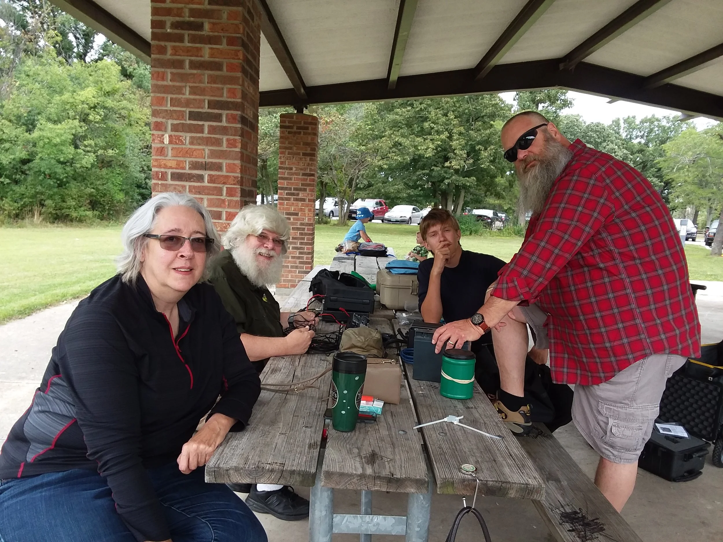 It was a beautiful day, and the group was happy to be outside - Kathy (KC9ESY), Dick (WA9NNN), Kyle (Strango), and John (KD9BYW).