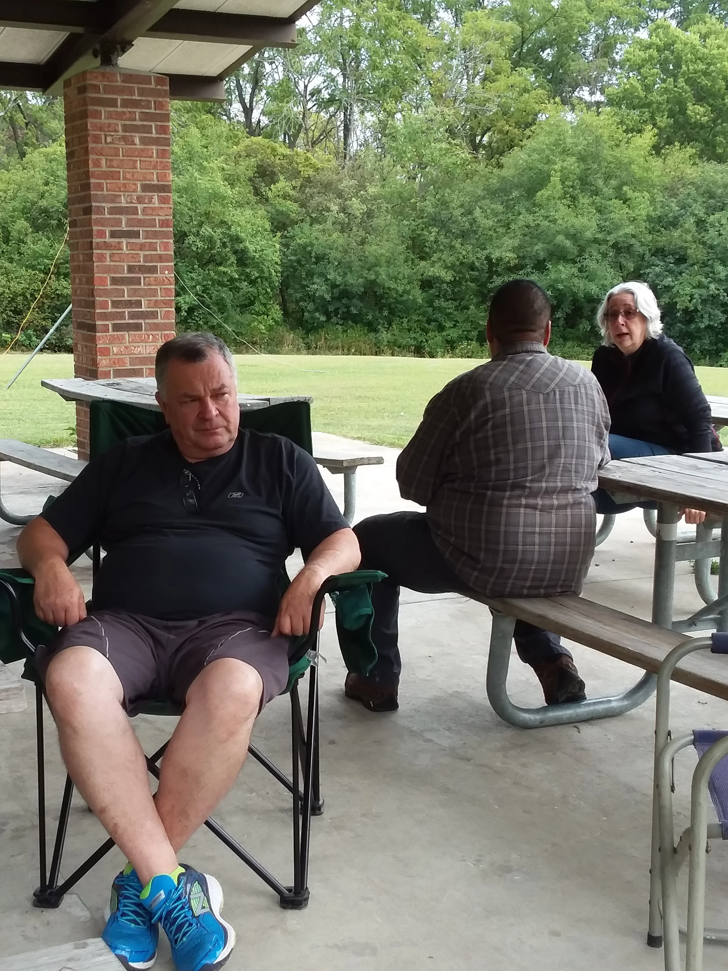 George (N9VTB), the back of Orlando (KD9EVC), and Kathy (KC9ESY).