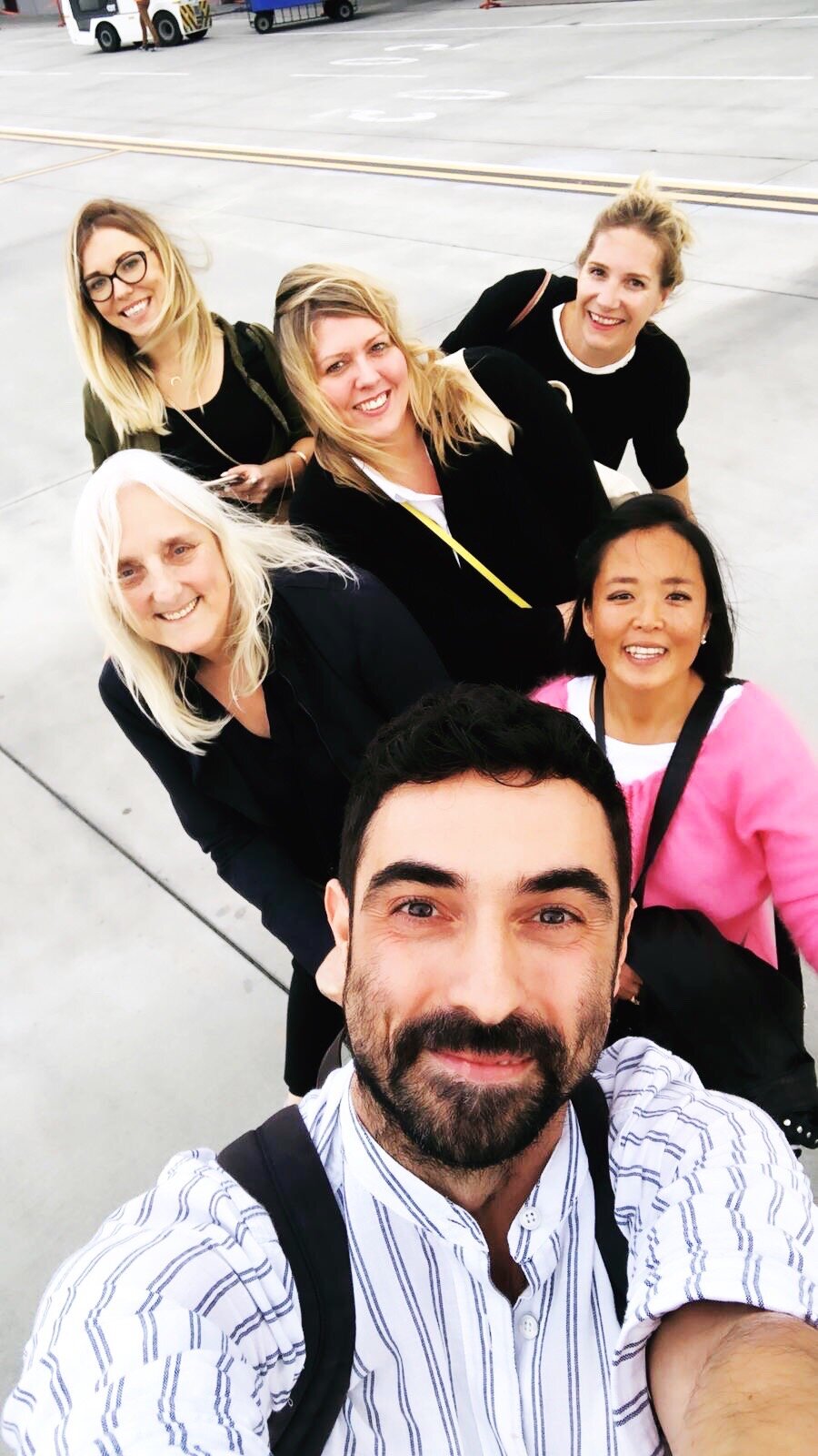 The moment we arrived in Romania, photographed outside of the plane by Igor in front. Agata, me, Niki, Desiree, Mette and Igor.