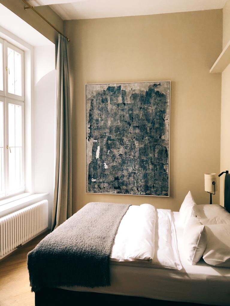 Another lovely room with huge windows and classical details
