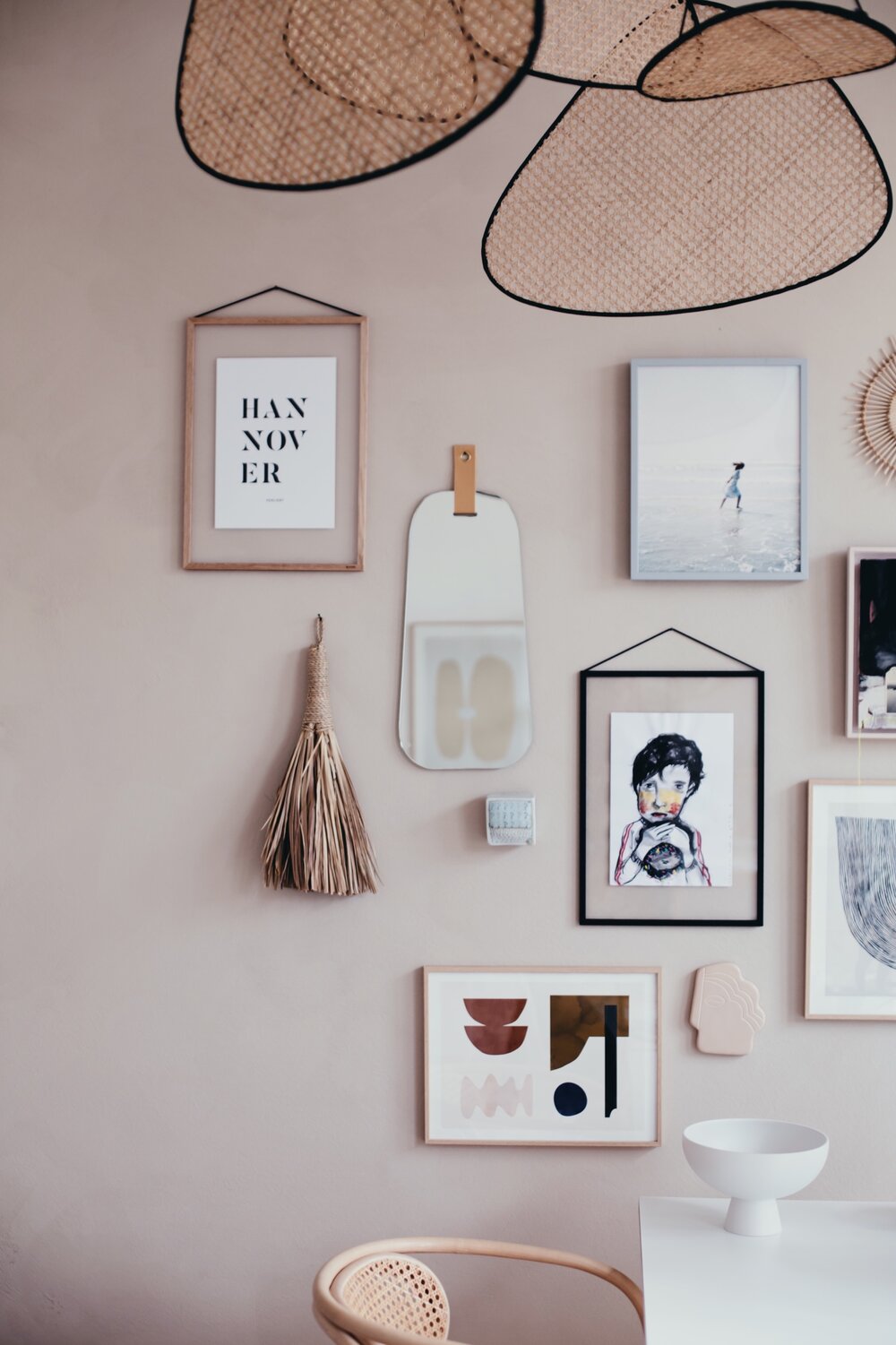 4 Ways To Select Art + Objects for a Gallery Art Wall Like Chrissy Tiegen
