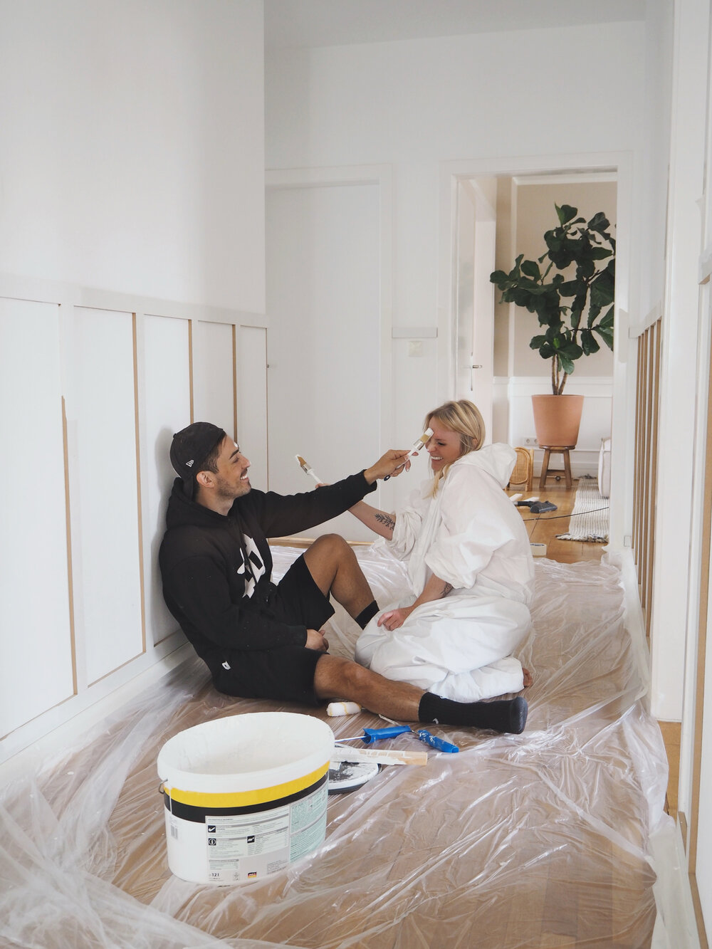 BEFORE - Adding wood molding and paint to their hallway