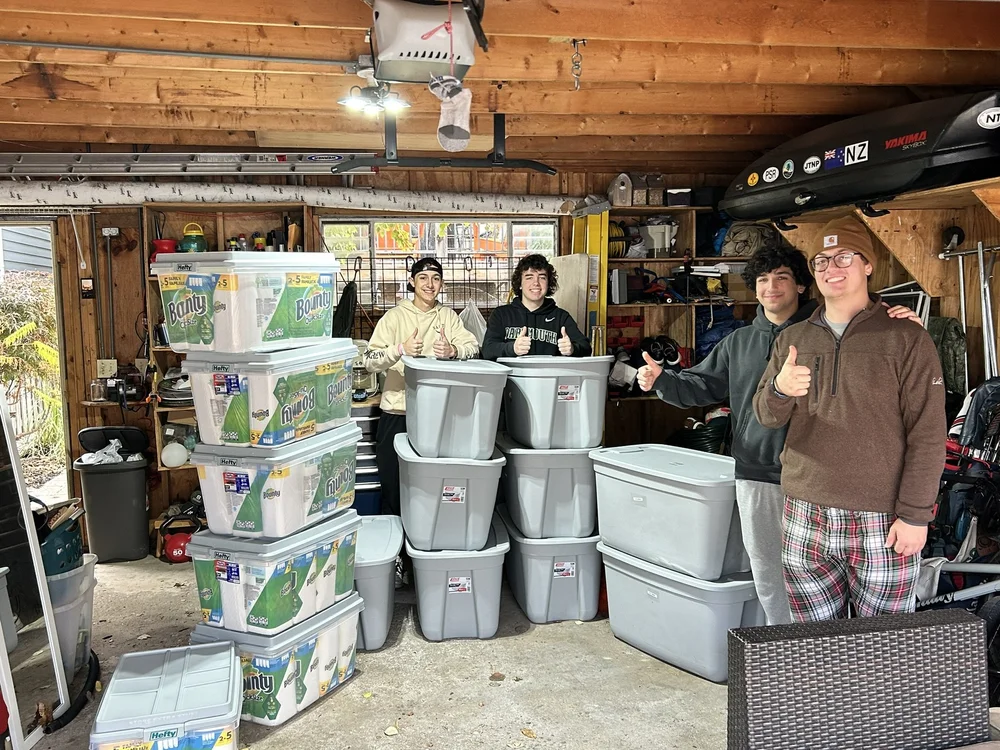 stacked totes and guys.JPEG