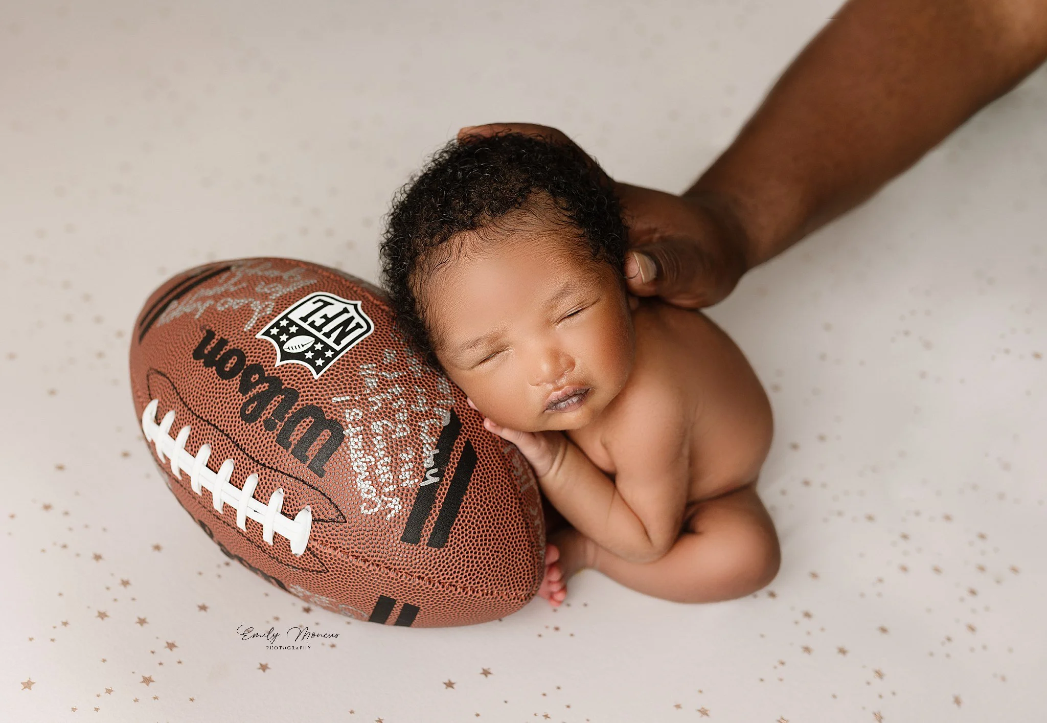 Savannah Newborn with a football