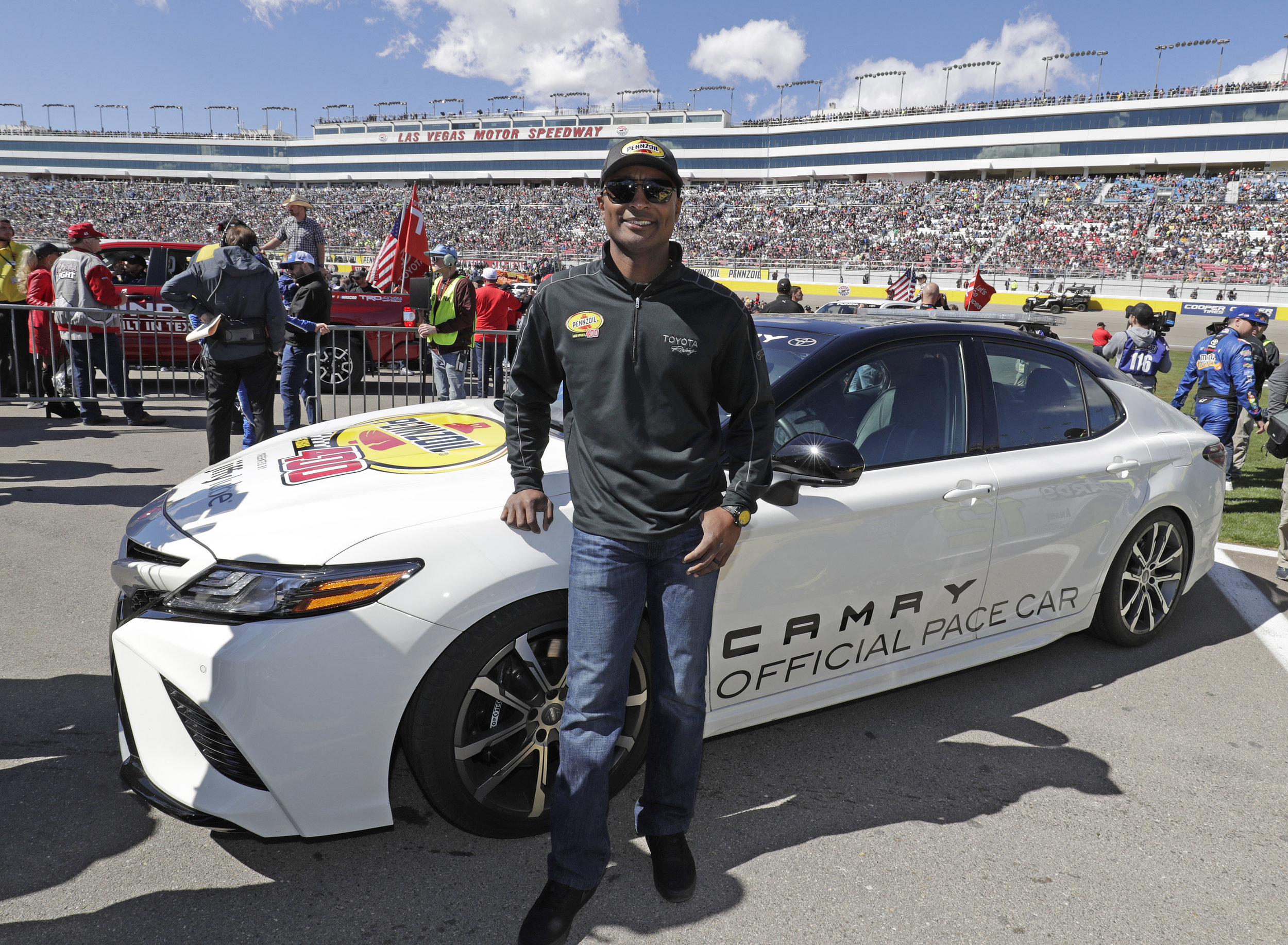 Antron Brown drives the pace car for the Pennzoil 400