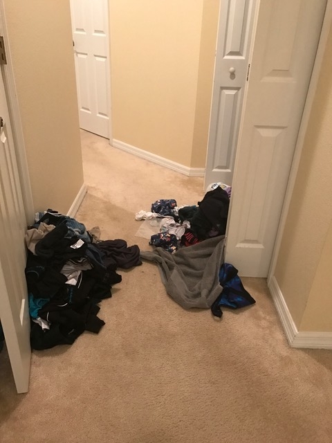 Current laundry situation in our hall - those are all clean (they've since been picked up and put in a laundry basket where they'll probably remain until tomorrow or this weekend)