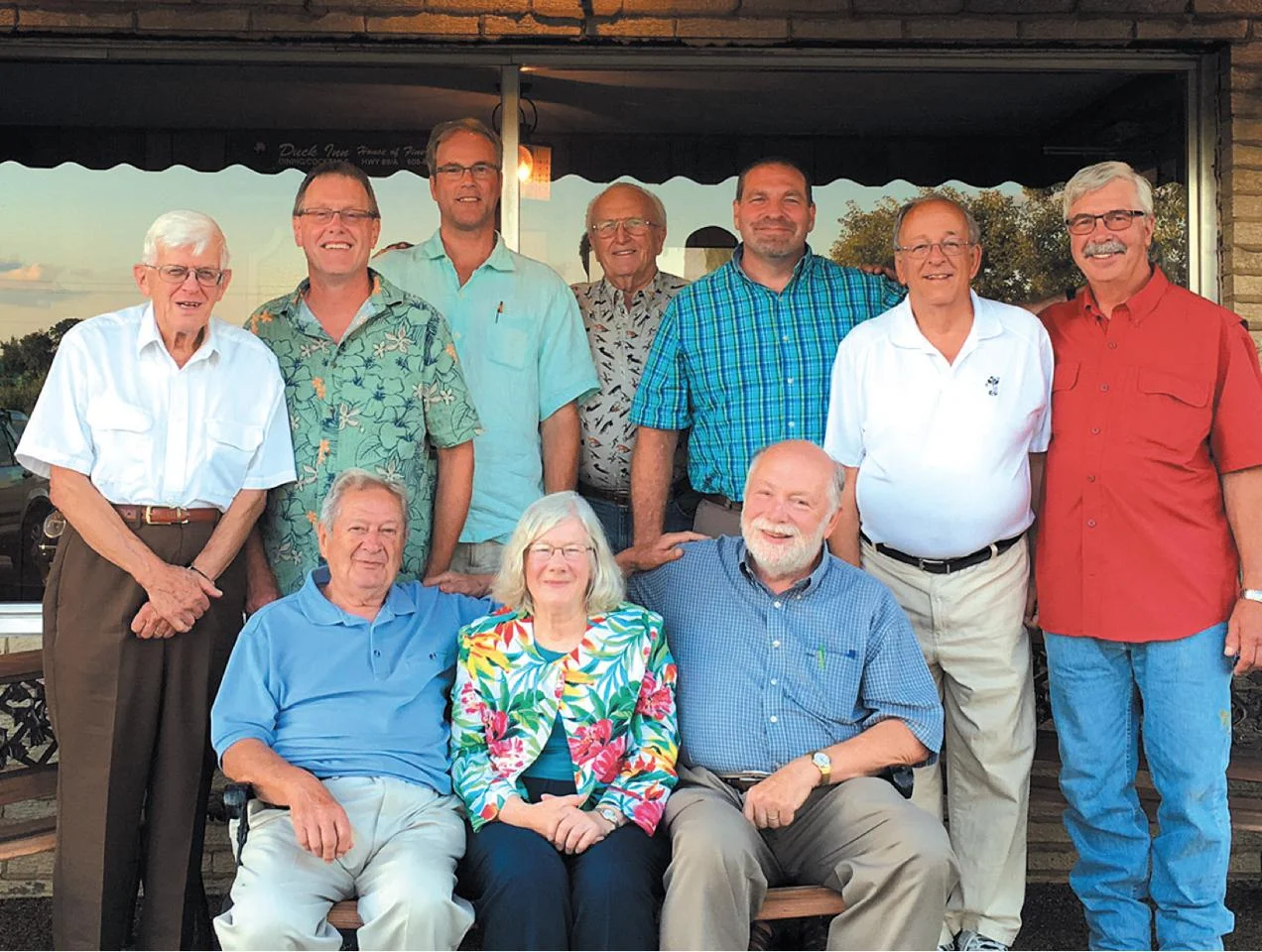 Lily enthusiasts posing outside the Duck Inn