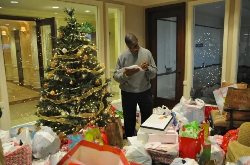 Previous CAPTRUST Community Foundation President Kevin Monroe volunteers his time to review last year's donations from CAPTRUST employees to Salvation Army Angel Tree kids. The Angel Tree donation drive was organized by the Foundation. 