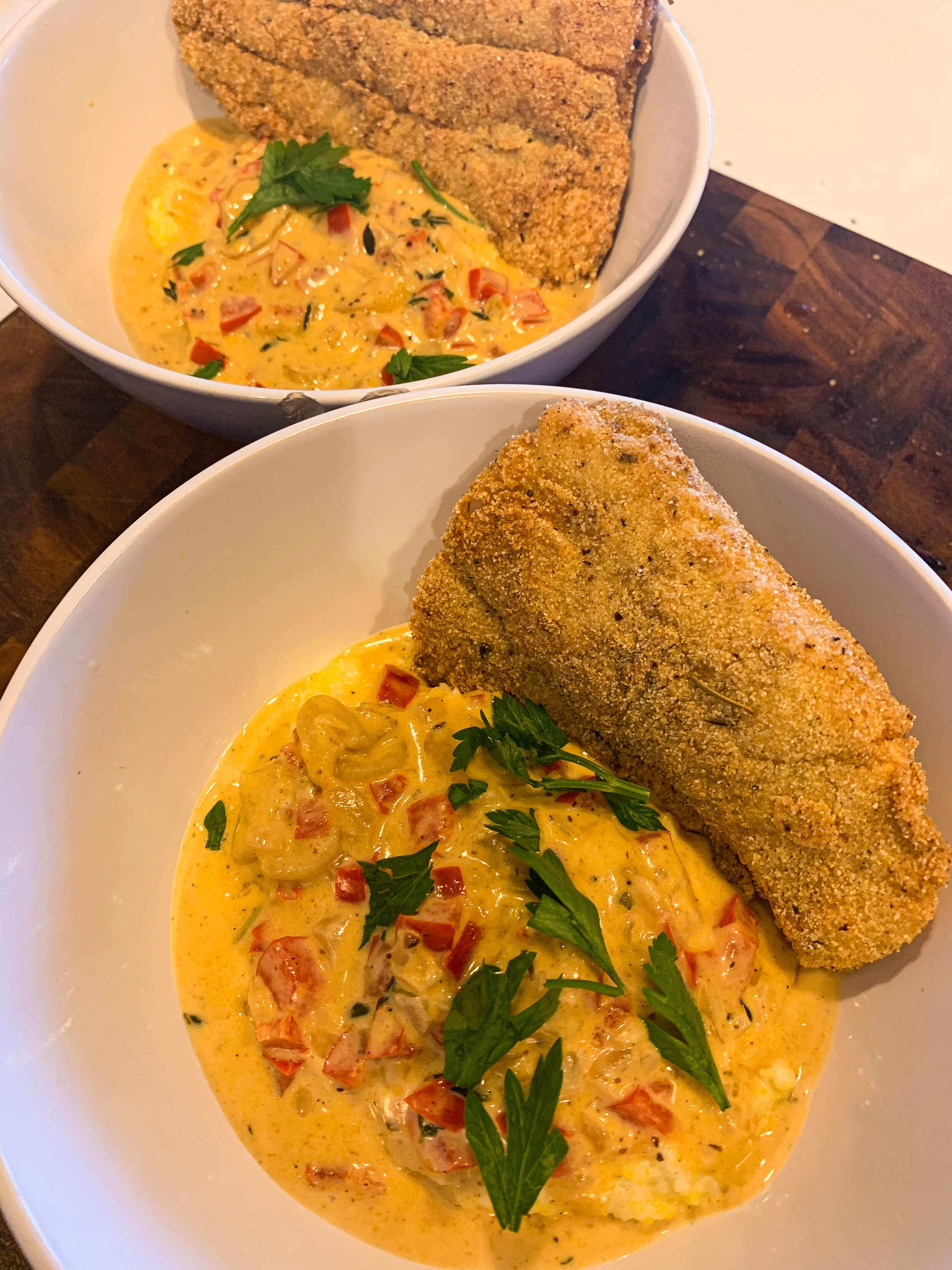 Fried Catfish with Cajun Cream Sauce over Grits