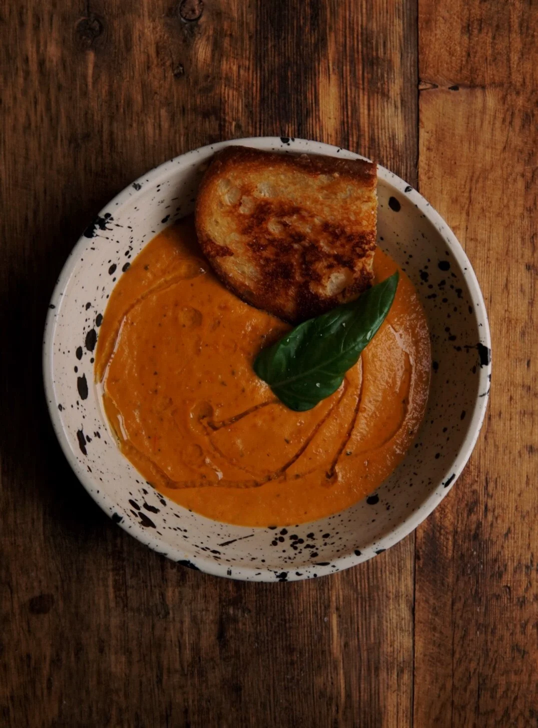 Tomato Basil Soup with Roasted Garlic Oil