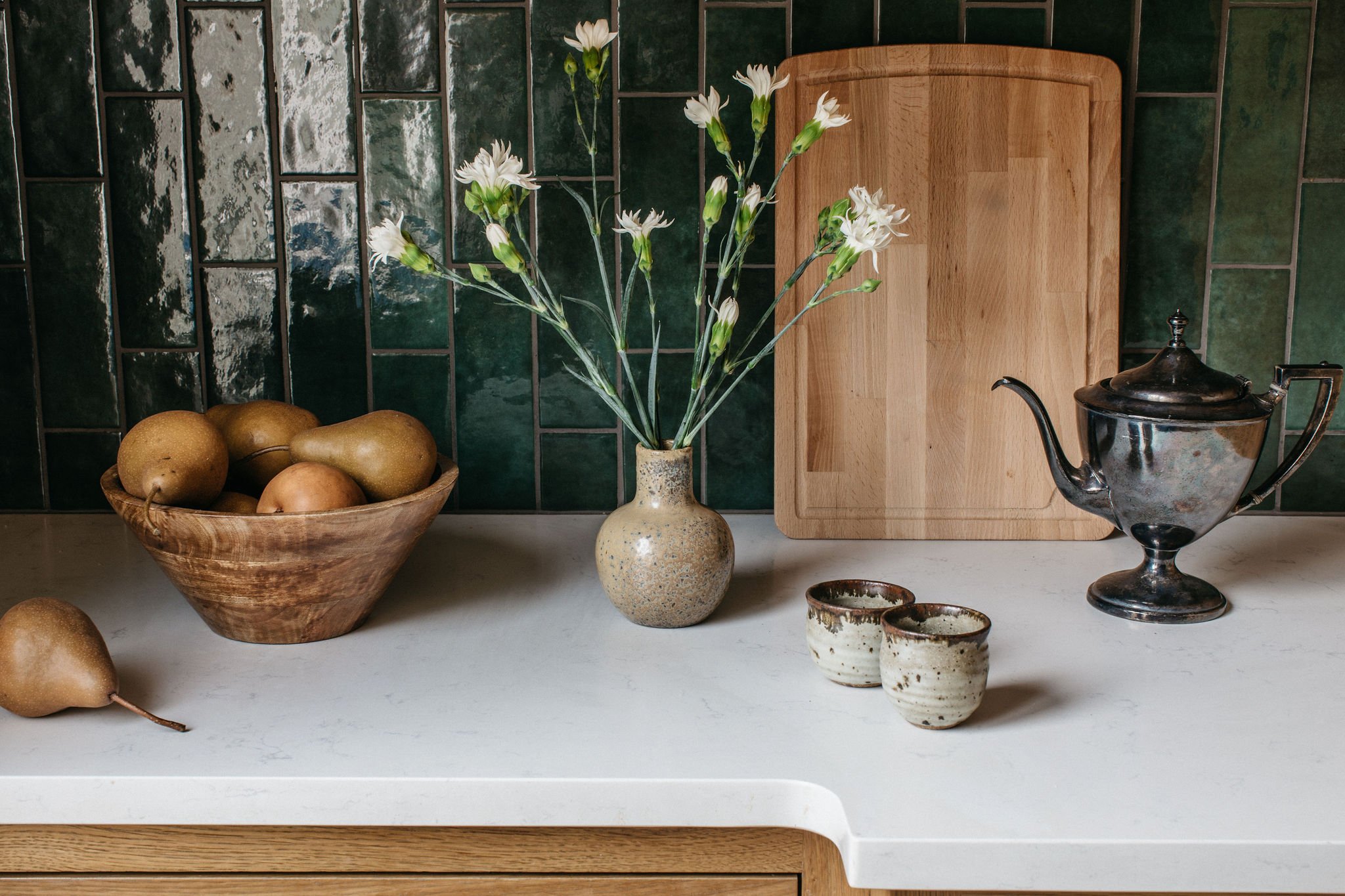kitchen-green-tile-marble-countertop-rustic-pottery-still-life-photography-flowers-vignette
