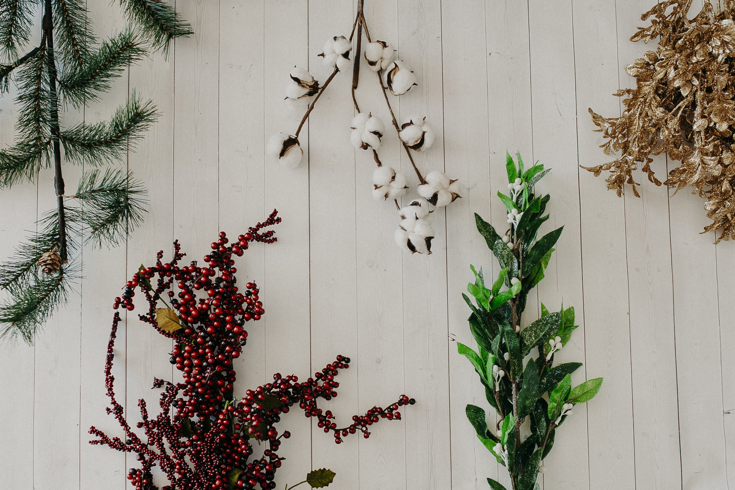  Step 1 -&nbsp;  Using your wire cutters, snip off the pieces of garland you wish to use in your winter sprig 