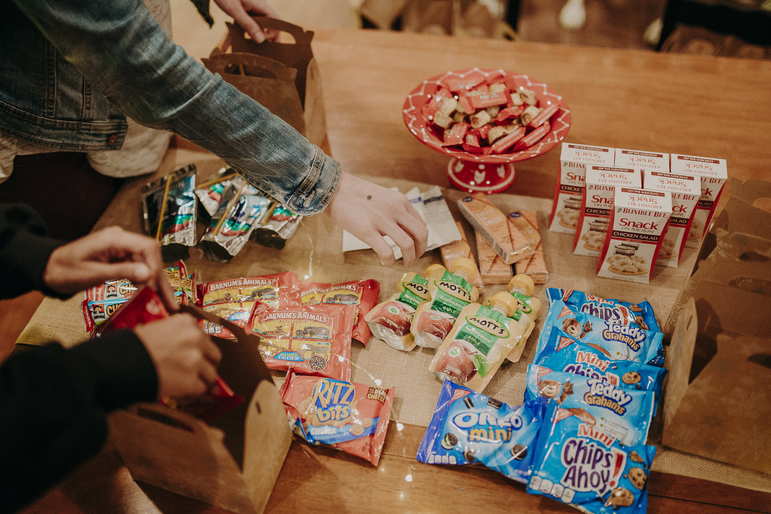  Once the boxes were all assembled, it was time to fill them. I tried to get a variety of foods, to satisfy any craving. From chocolates, to chicken salad with crackers, to applesauce. I hoped there was something for everyone. 