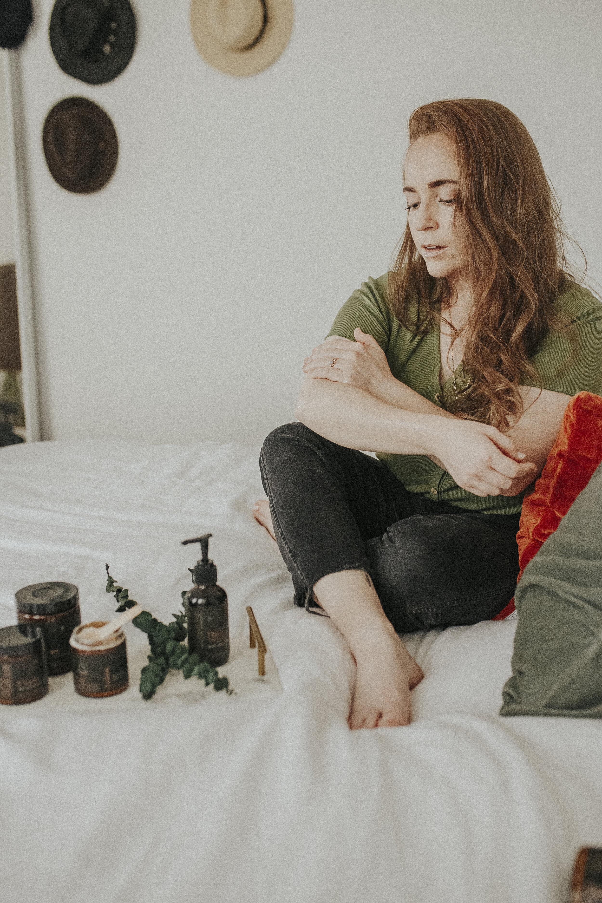  I begin by gently dry brushing my entire body, in long strokes, starting on the outside (toes and fingers) and working towards my heart. Next, I follow it up with an oil bath, where I use the    Holy Wild Body Oil    to nourish and moisturize my ski