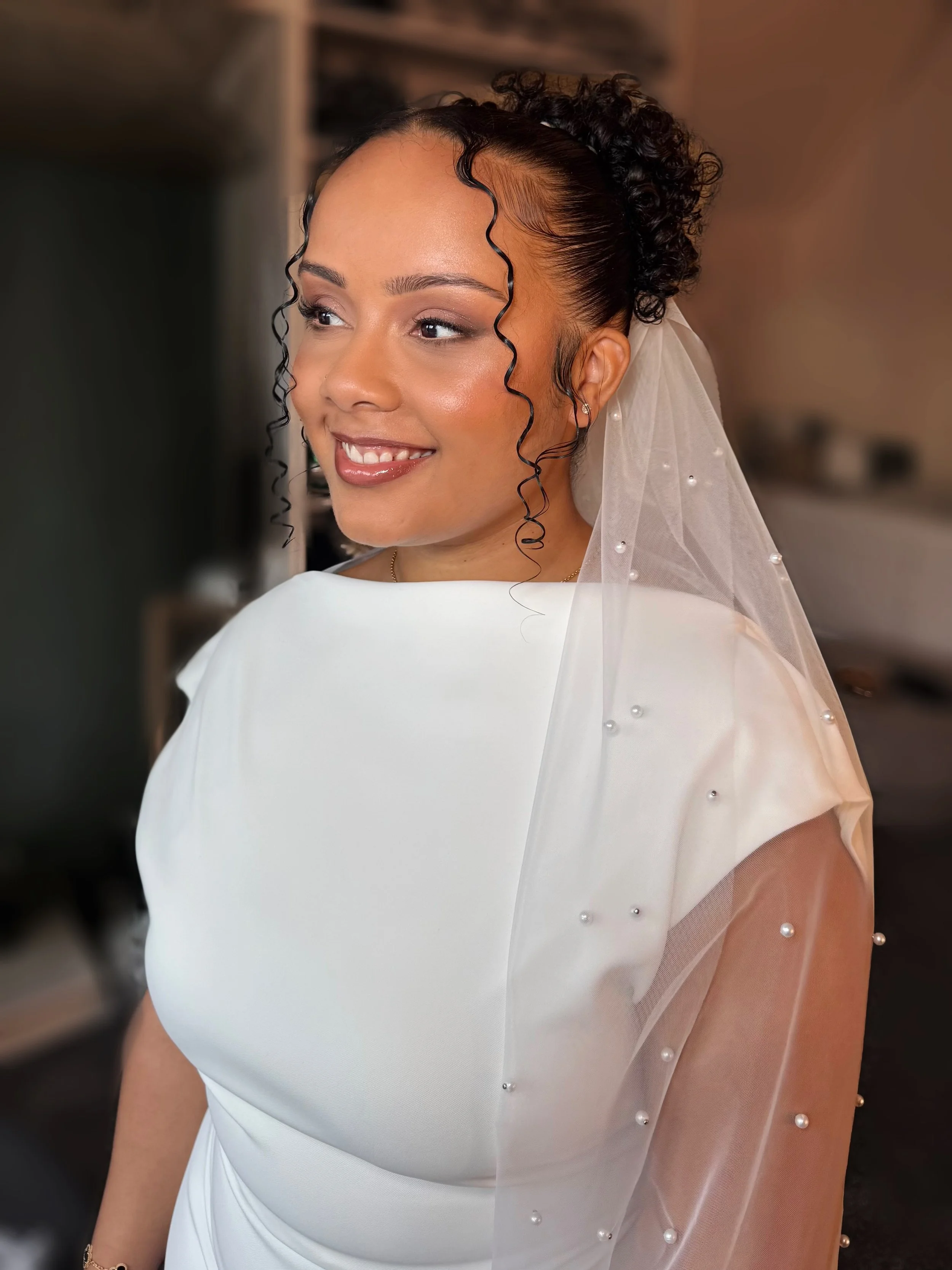 A radiant soft glam bridal makeup