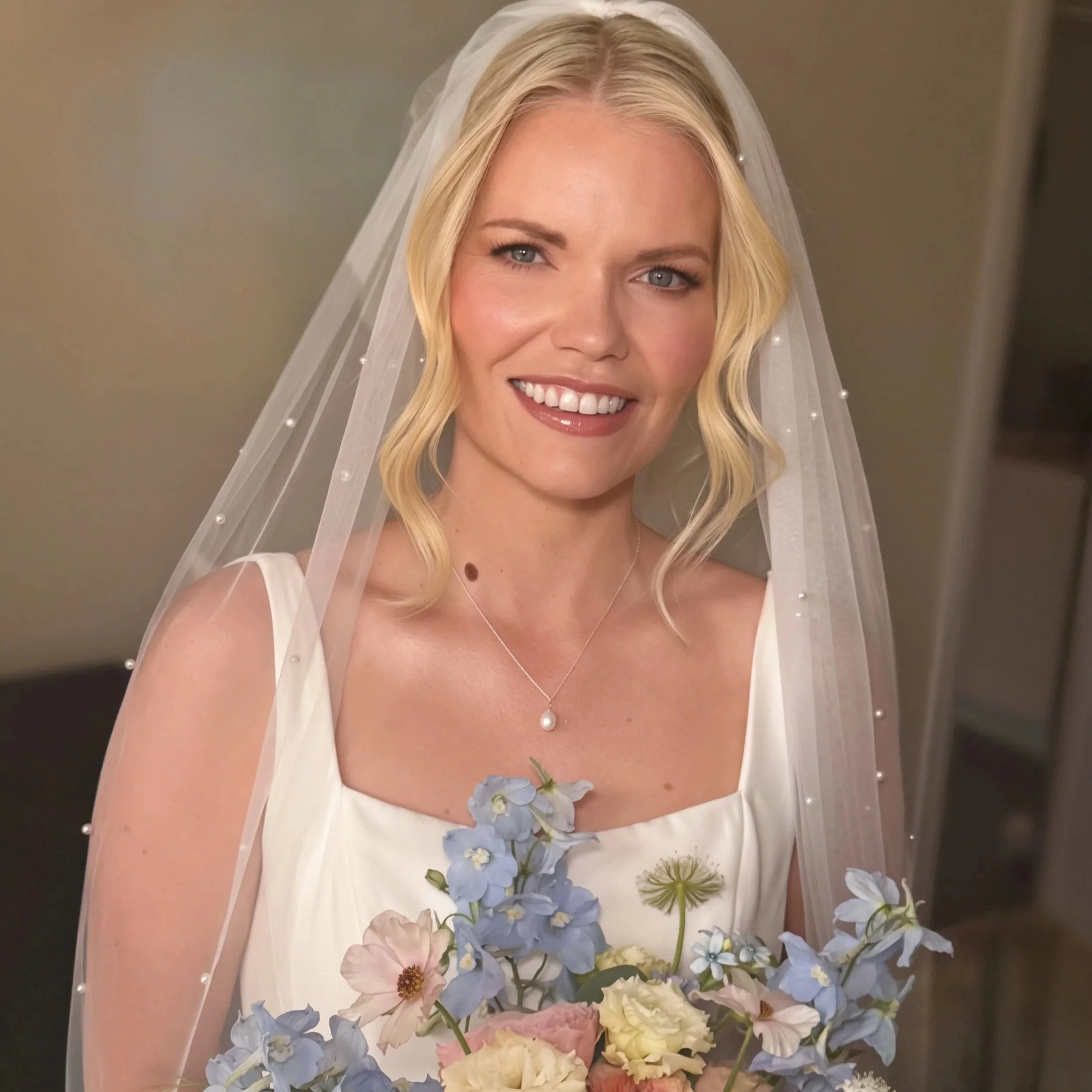 Bride wearing soft, radiant bridal makeup by a professional bridal makeup artist in Reading, Berkshire.