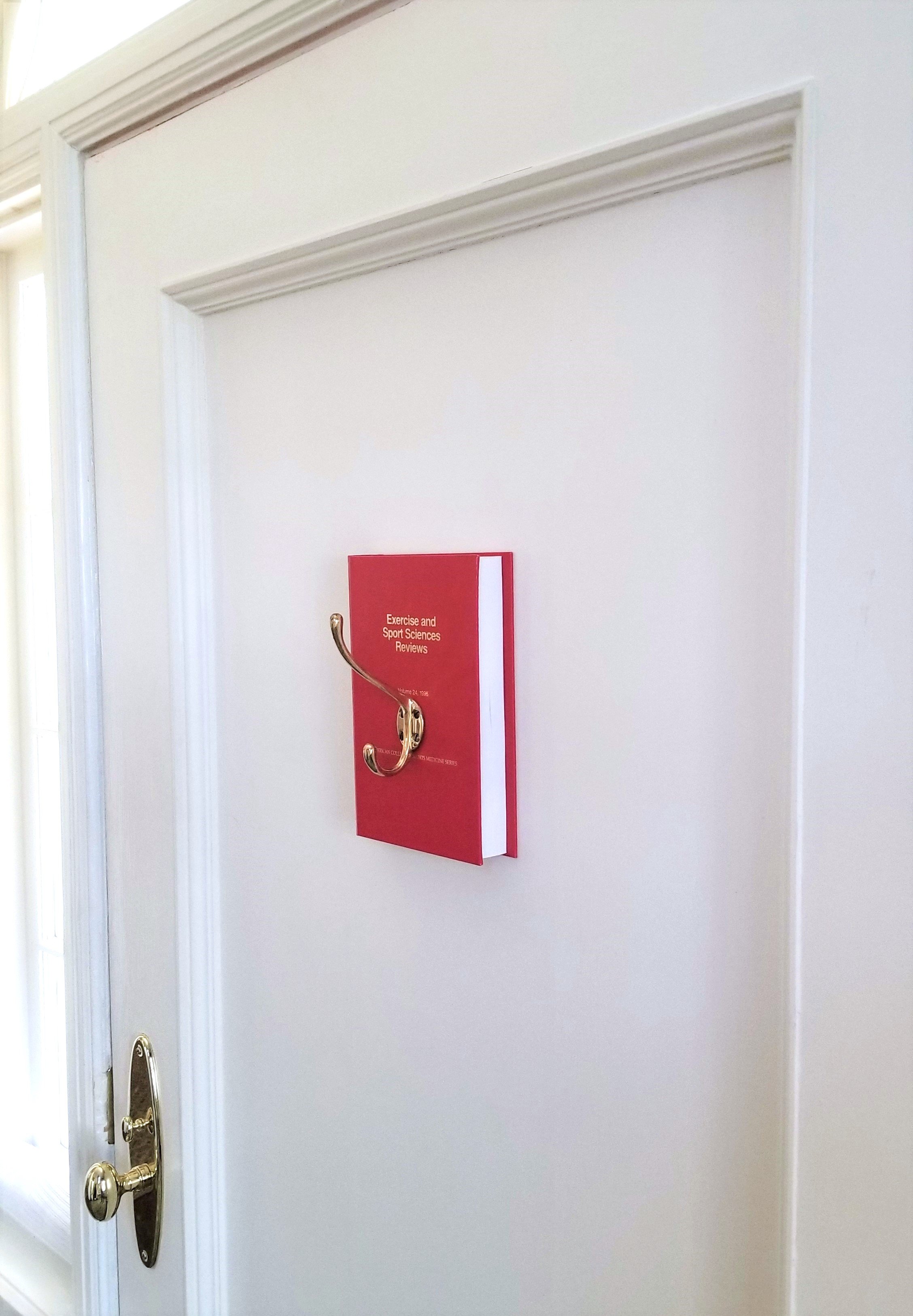 CoathangerOnBook (2).jpg