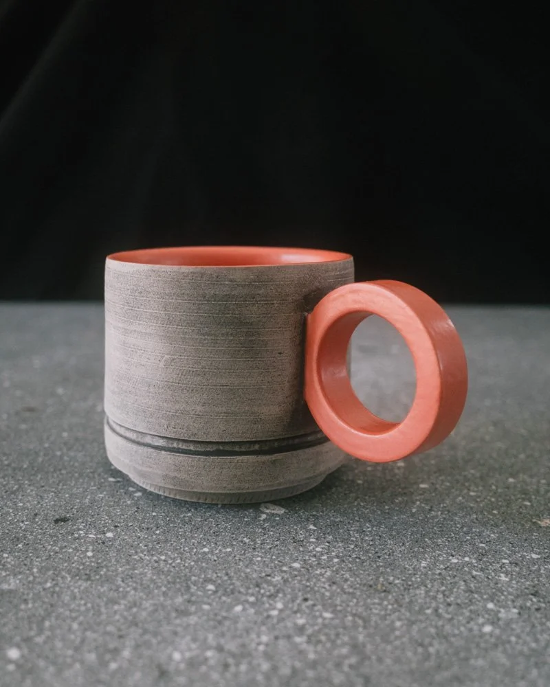 grey and orange mug