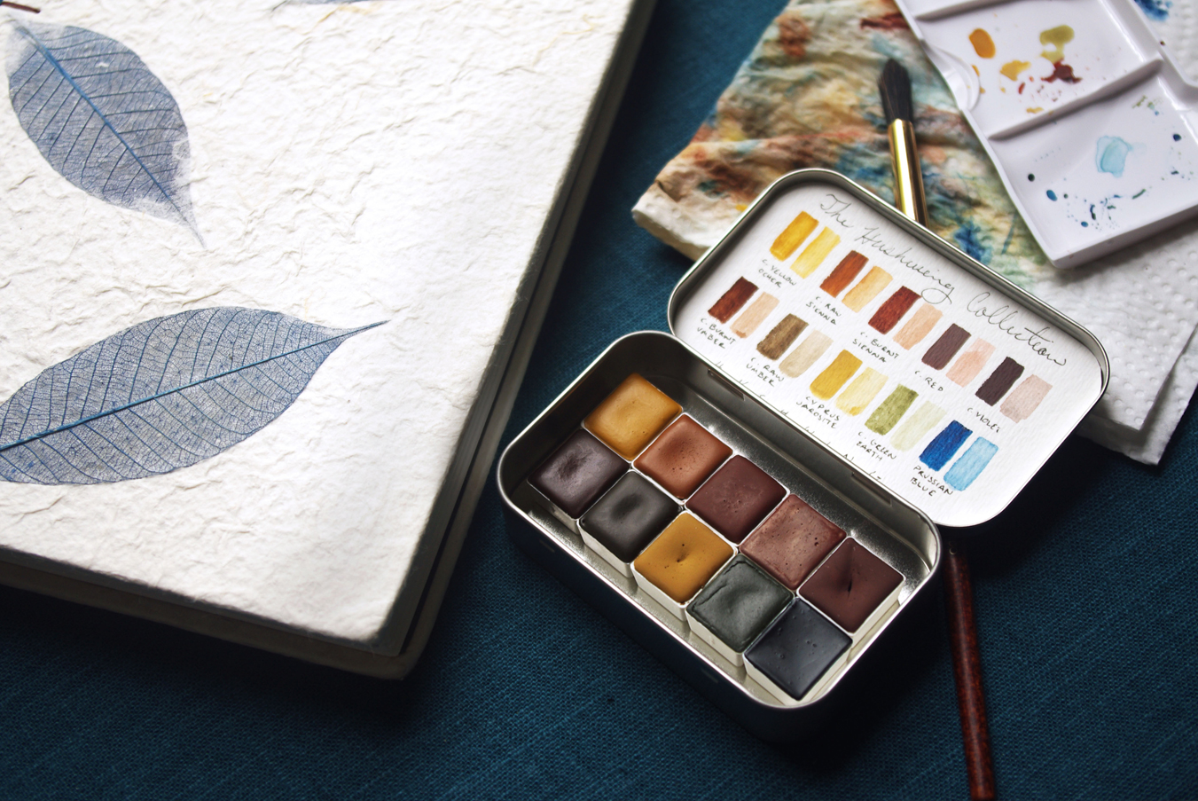 Custom sketchbook pictured here with The Hushwing Collection palette. 