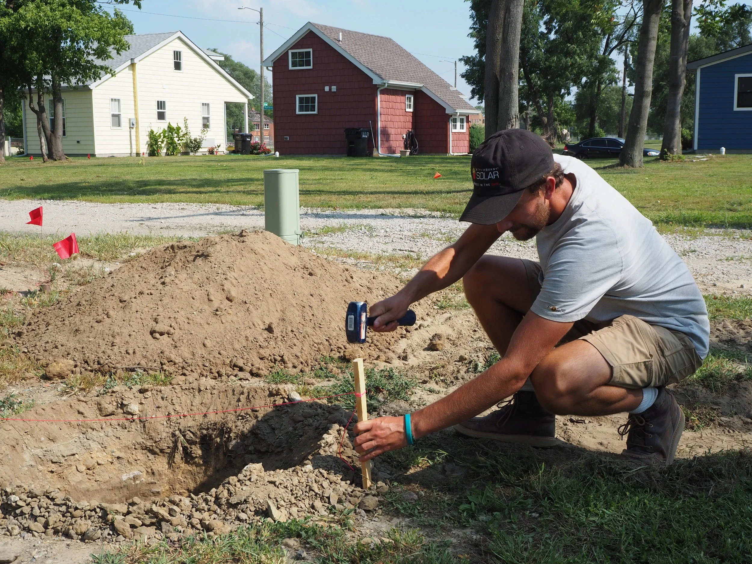 Strawberry Solar Managing Partner, William Held, prepared pole mounts for the Tiny Homes custom solar arrays. An array is a group of solar panels used to generate electricity. The amount of panels used for an array depends on a home’s energy needs.
