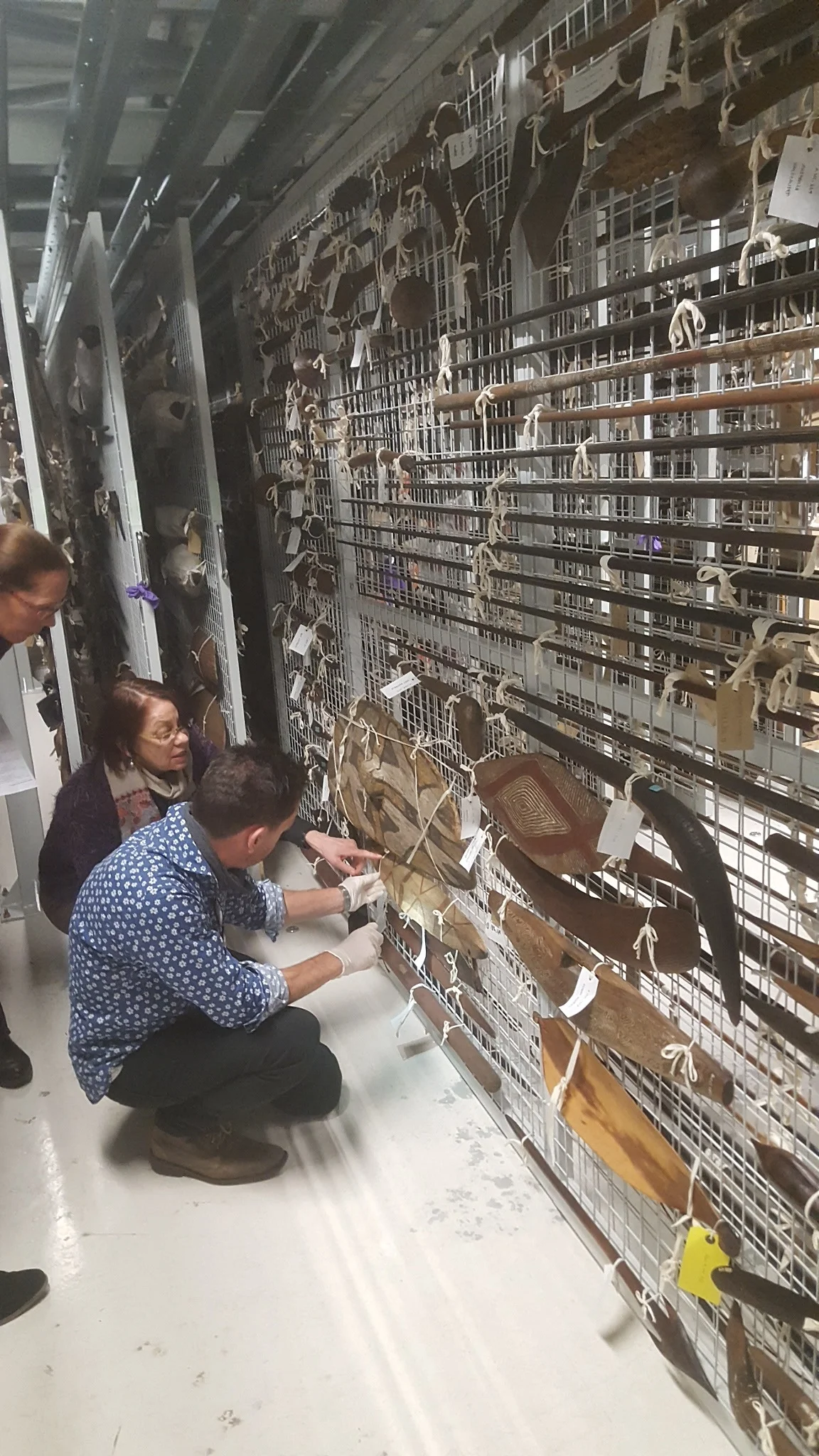 Above: Collecting the West researchers examine items from the Neill collection at National Museums Scotland. Image reproduced by kind permission of National Museums Scotland.