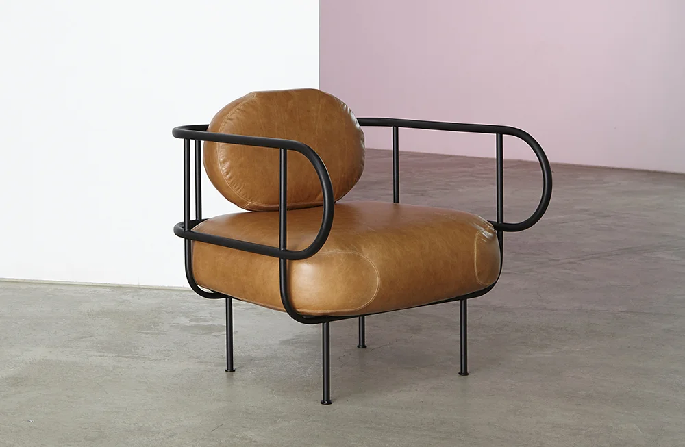 NAVE CHAIR designed by SKEEHAN Studio - with its slender frame, is an expression of nautical construction processes.