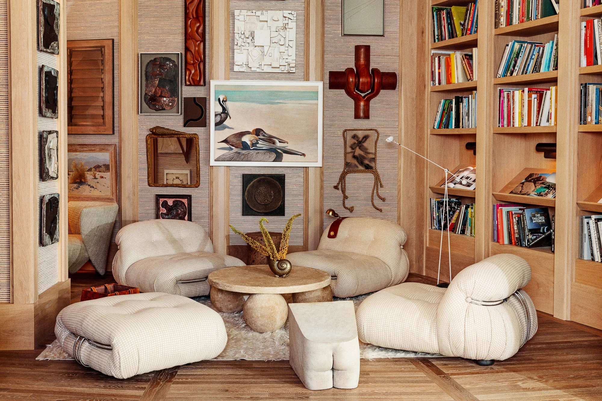 The cosy little reading nook in the lobby bar is completed with soft linen chairs and marble sculptures.