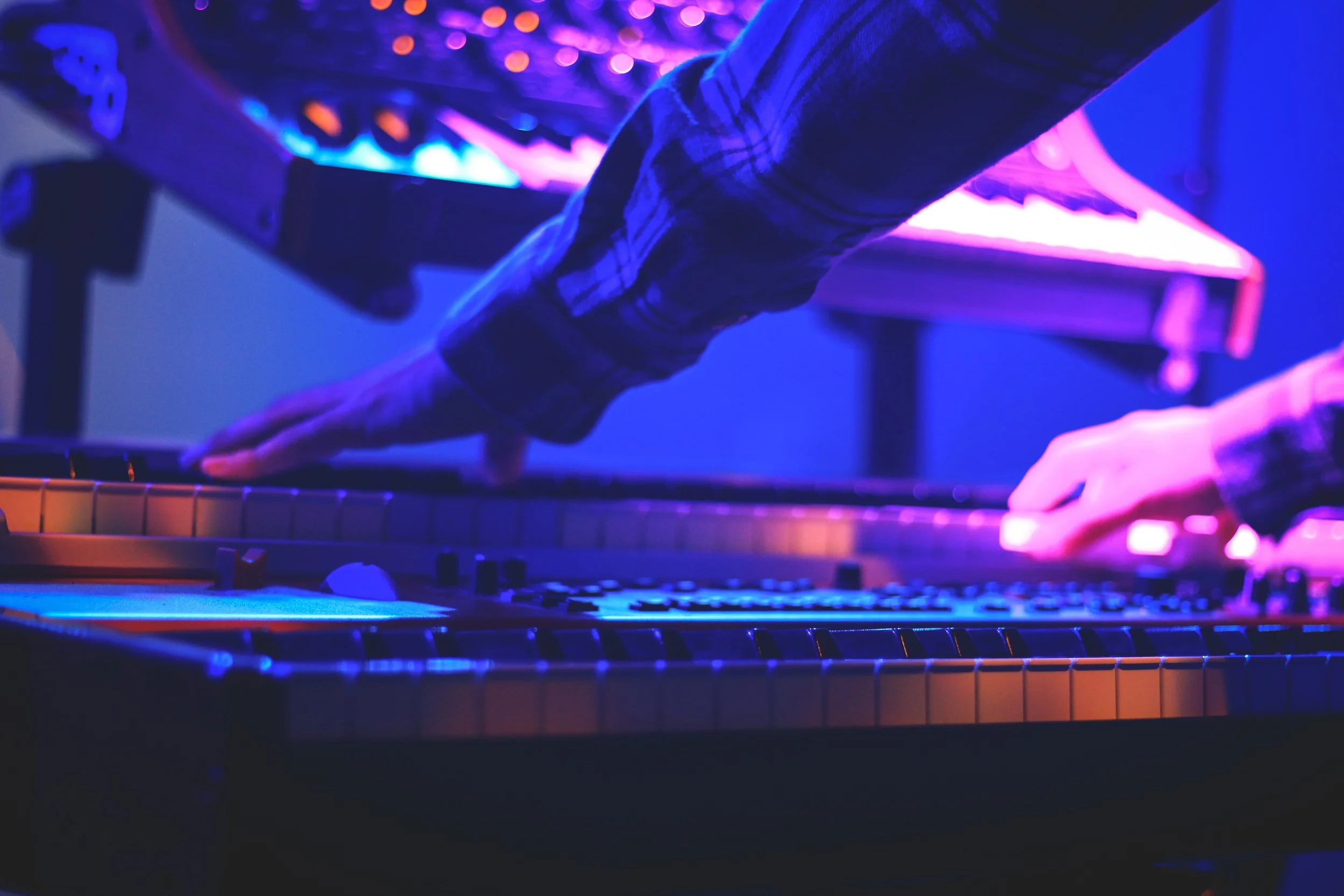 Background of Jeff playing piano.