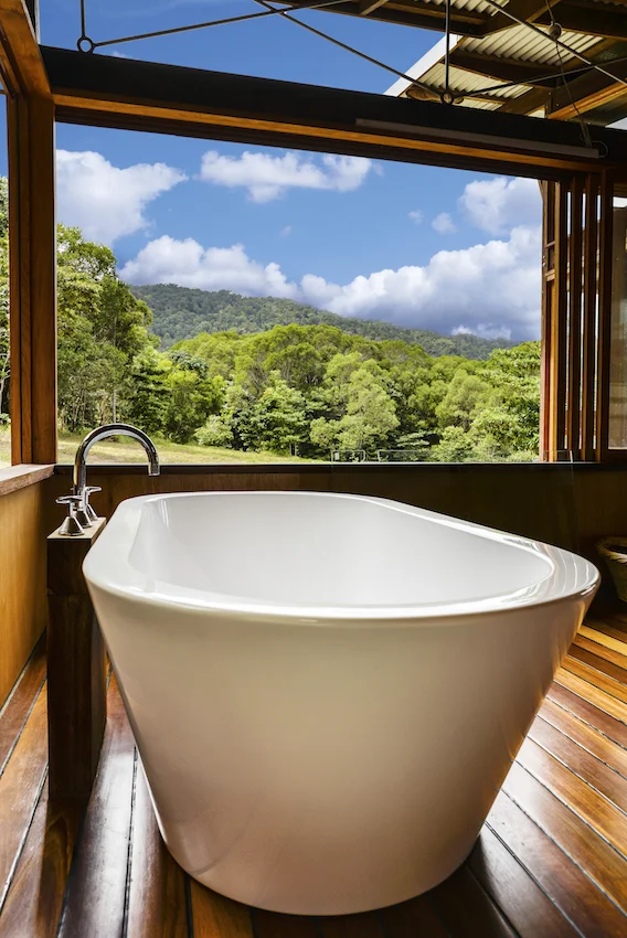 The favourite feature is the bath with sublime views of the rainforest ridgeline, perfect for relaxing after a hard working day.
