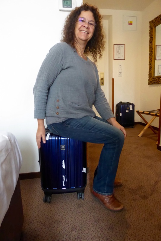 Little Vanna posing with the teeny-tiny Samsonite. 
