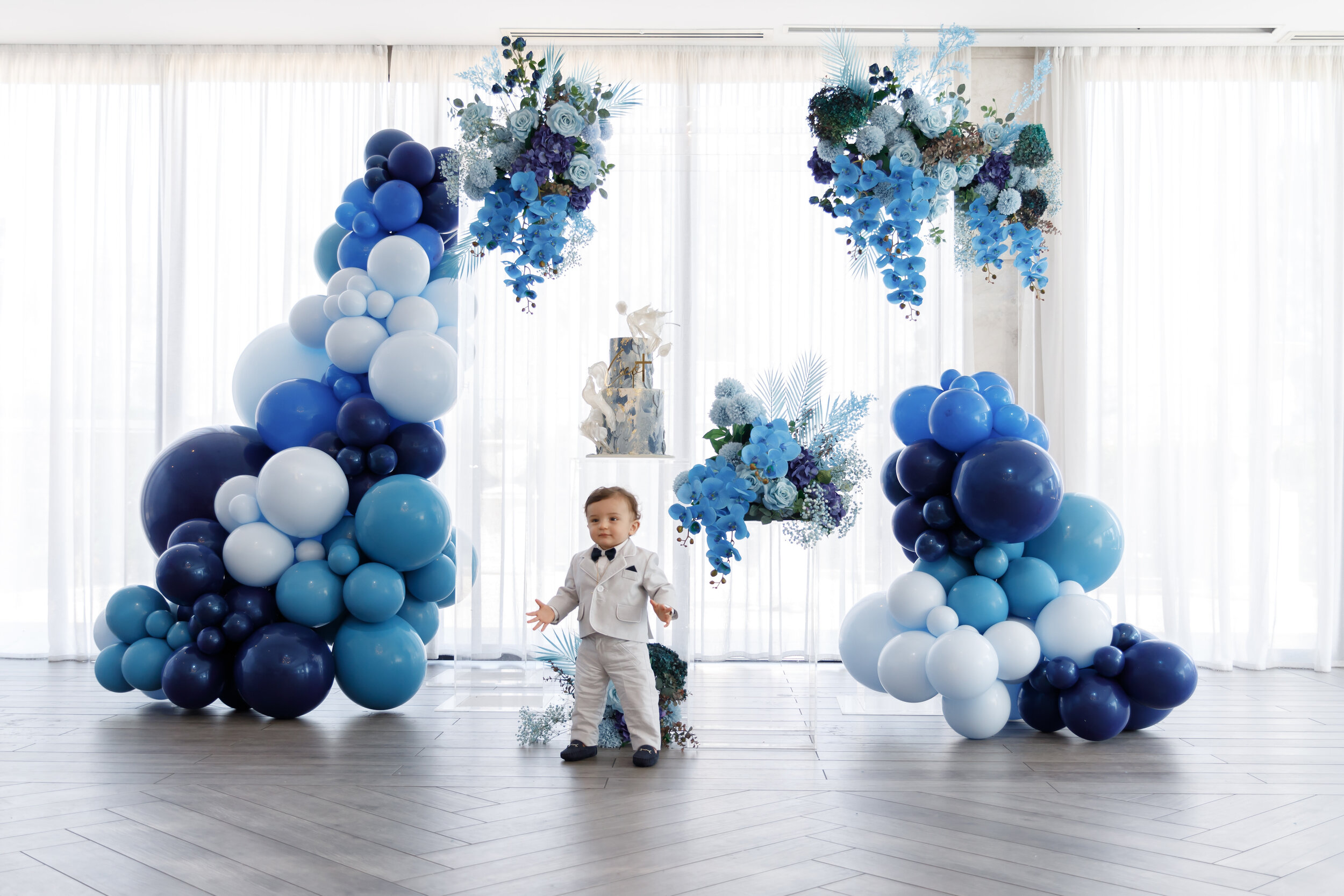Shades of blue christening event flowers and styling