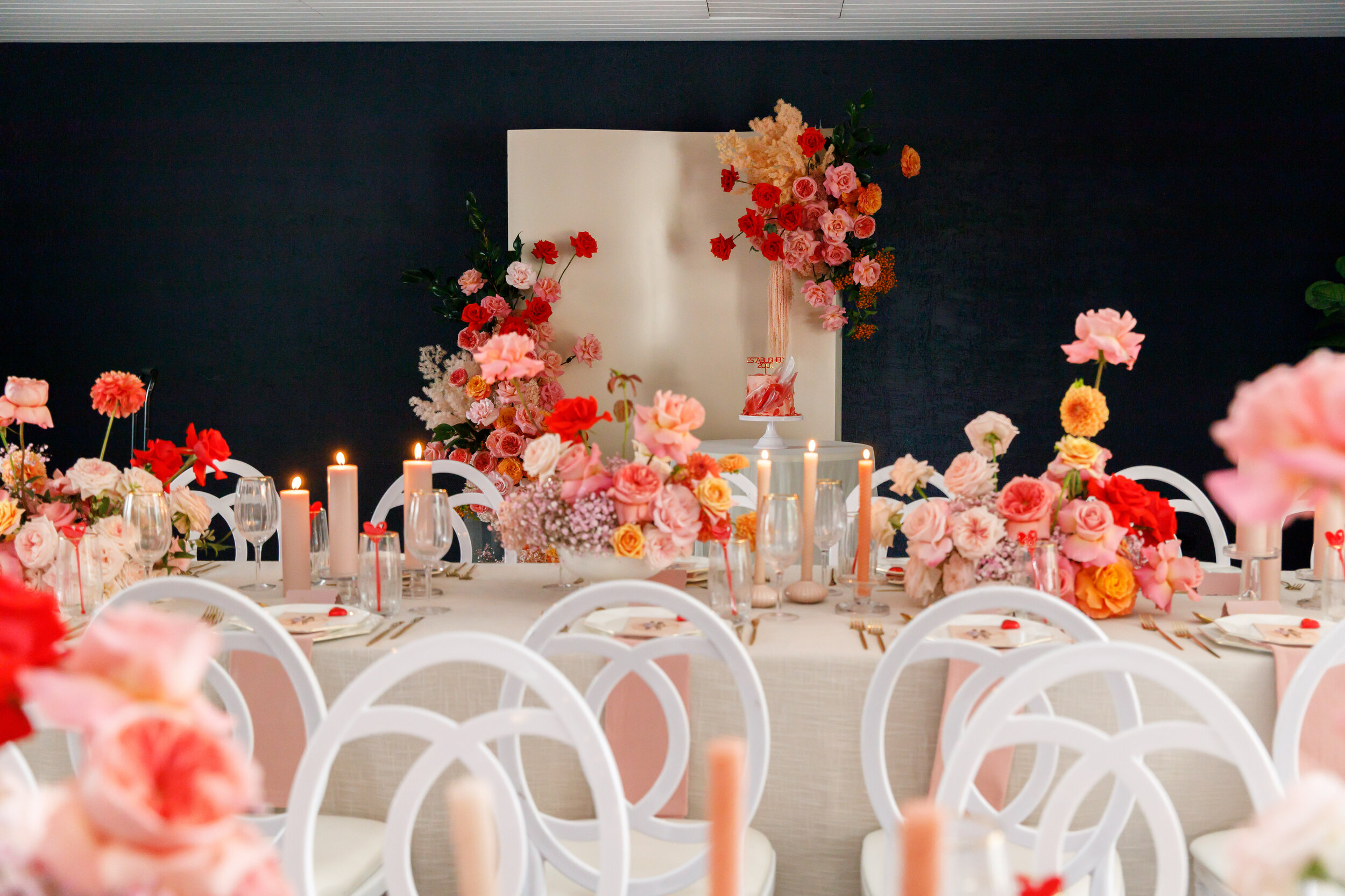 Bright bold flowers red and pink decorations flowers Sydney event 