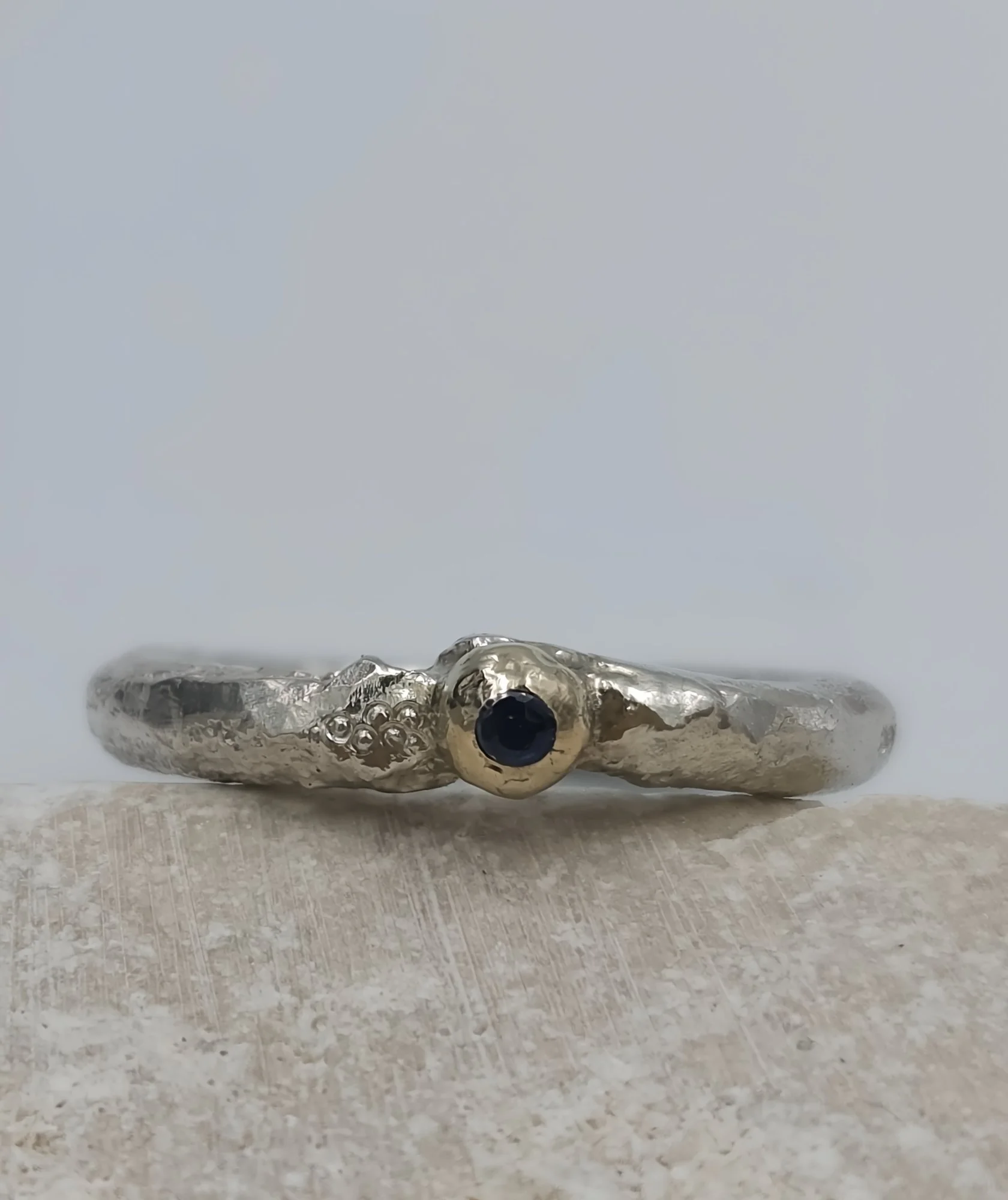 silvergoldsapphirering.jpg