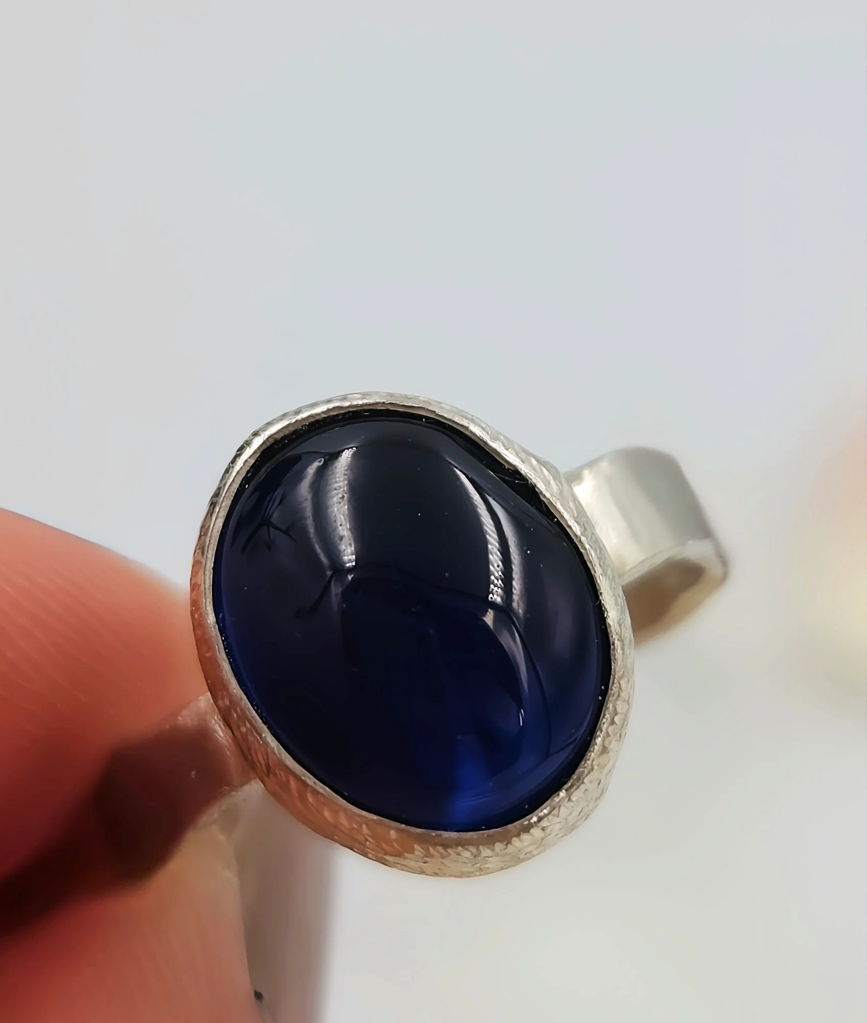 Oval Synthetic Sapphire Ring in Molten Textured Sterling Silver